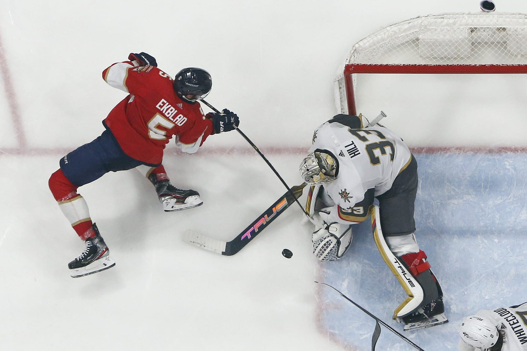 SUNRISE, FL - MARCH 7: Goaltender Adin Hill #33 of the Vegas Golden Knights stops a shot by Aaron Ekblad #5 of the Florida Panthers at the FLA Live Arena on March 7, 2023 in Sunrise, Florida. (Photo by Joel Auerbach/Getty Images)