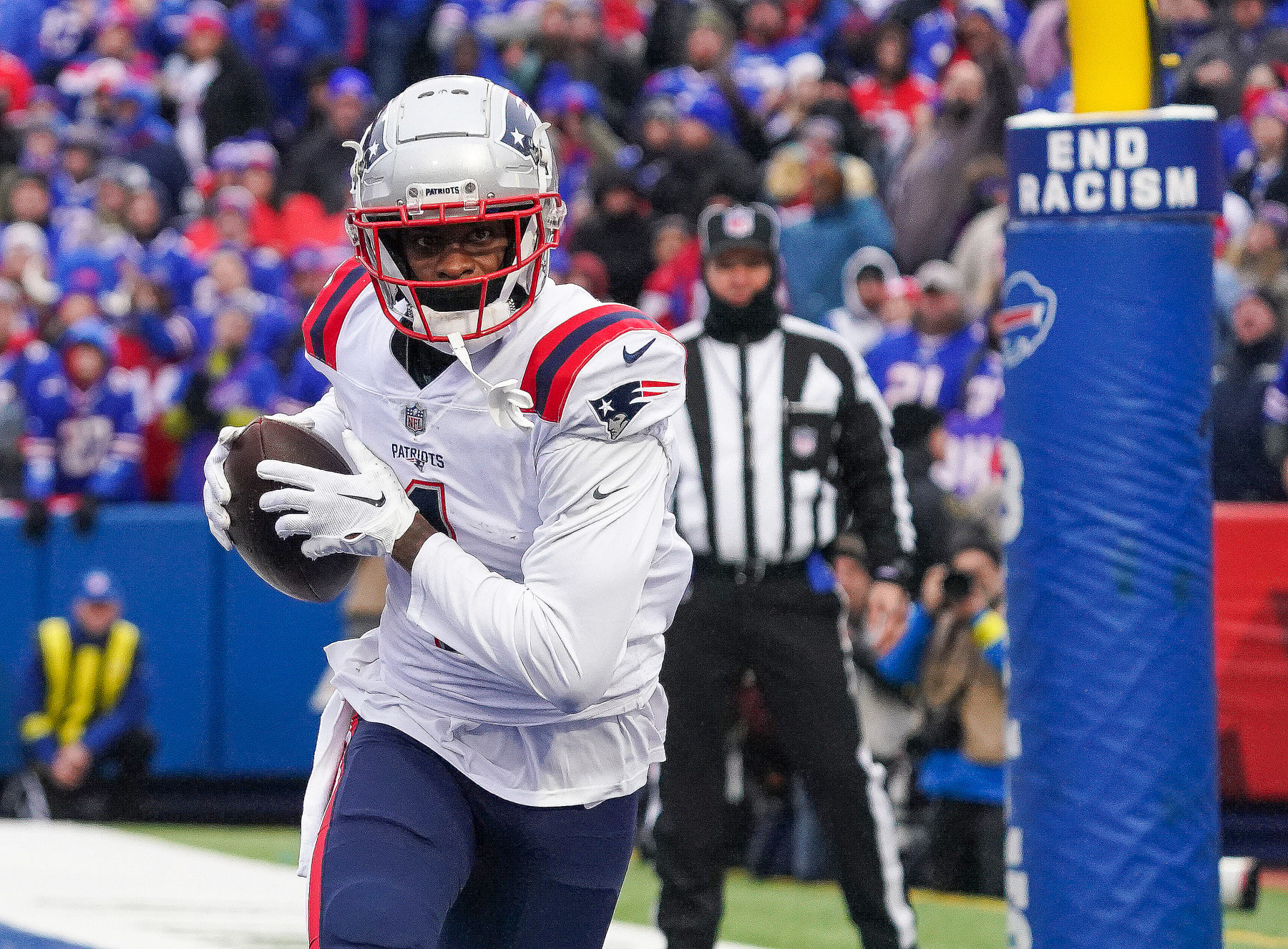 August 19, 2023: Miami Dolphins running back Salvon Ahmed (26) carries the  ball as Houston Texans safety Jimmie Ward (1) looks on after missing a  tackle during an NFL preseason game between