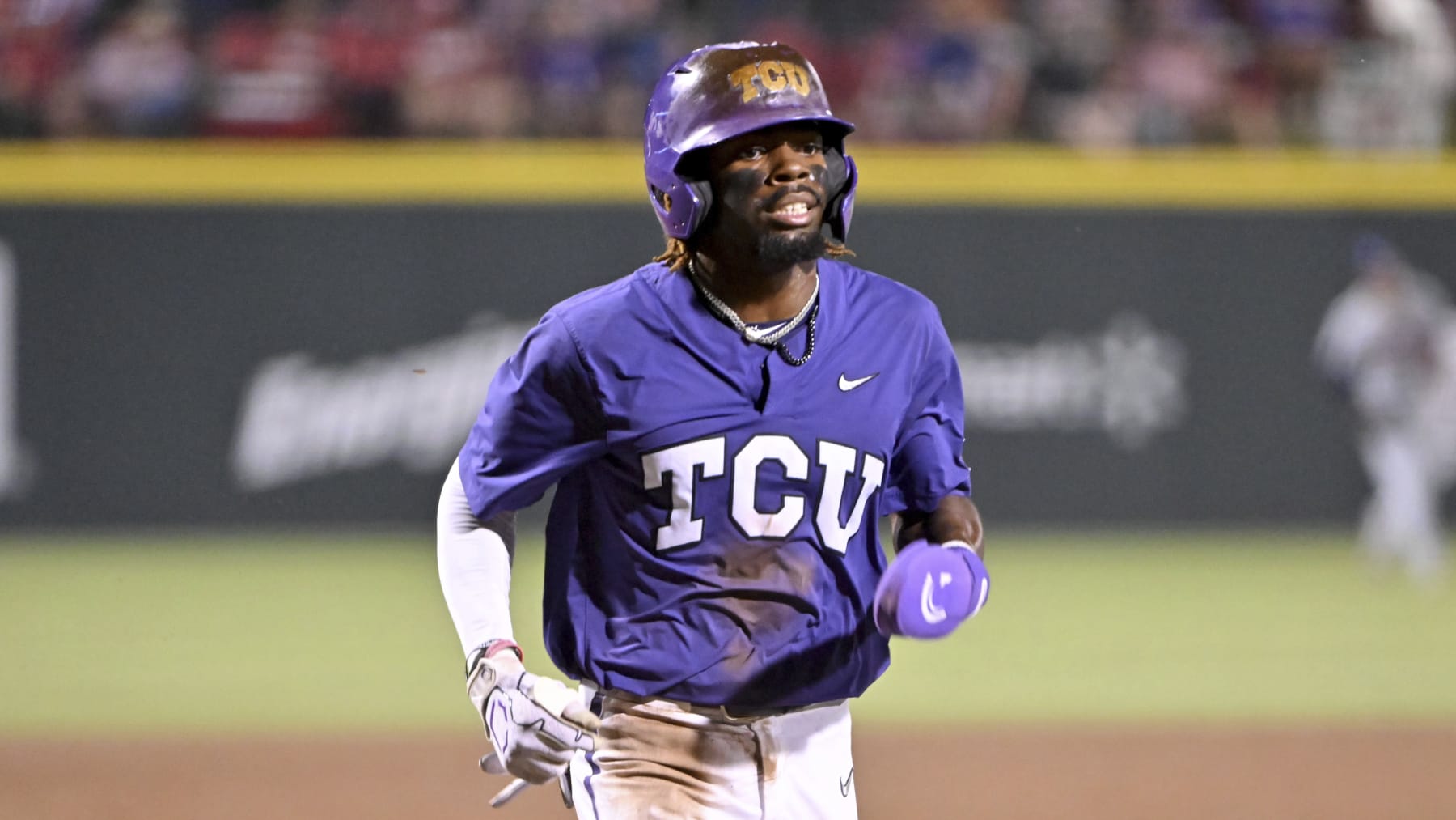 TCU baserunner Tre Richardson (0) against Arizona during an NCAA baseball game on Friday, June 2, 2023, in Fayetteville, Ark. (AP Photo/Michael Woods)