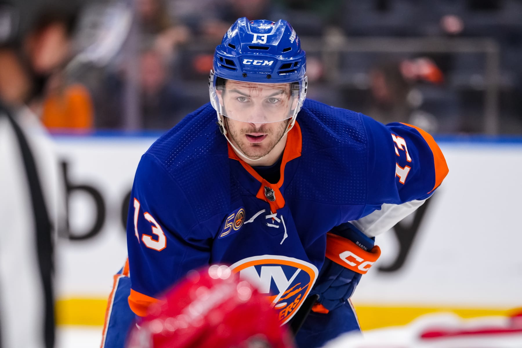 ELMONT, NEW YORK - APRIL 28: Mathew Barzal #13 of the New York Islanders looks on in Game Six of the First Round of the 2023 Stanley Cup Playoffs vs the Carolina Hurricanes at UBS Arena on April 28, 2023 in Elmont, United States. (Photo by Dennis DaSilva /NHLI via Getty Images)