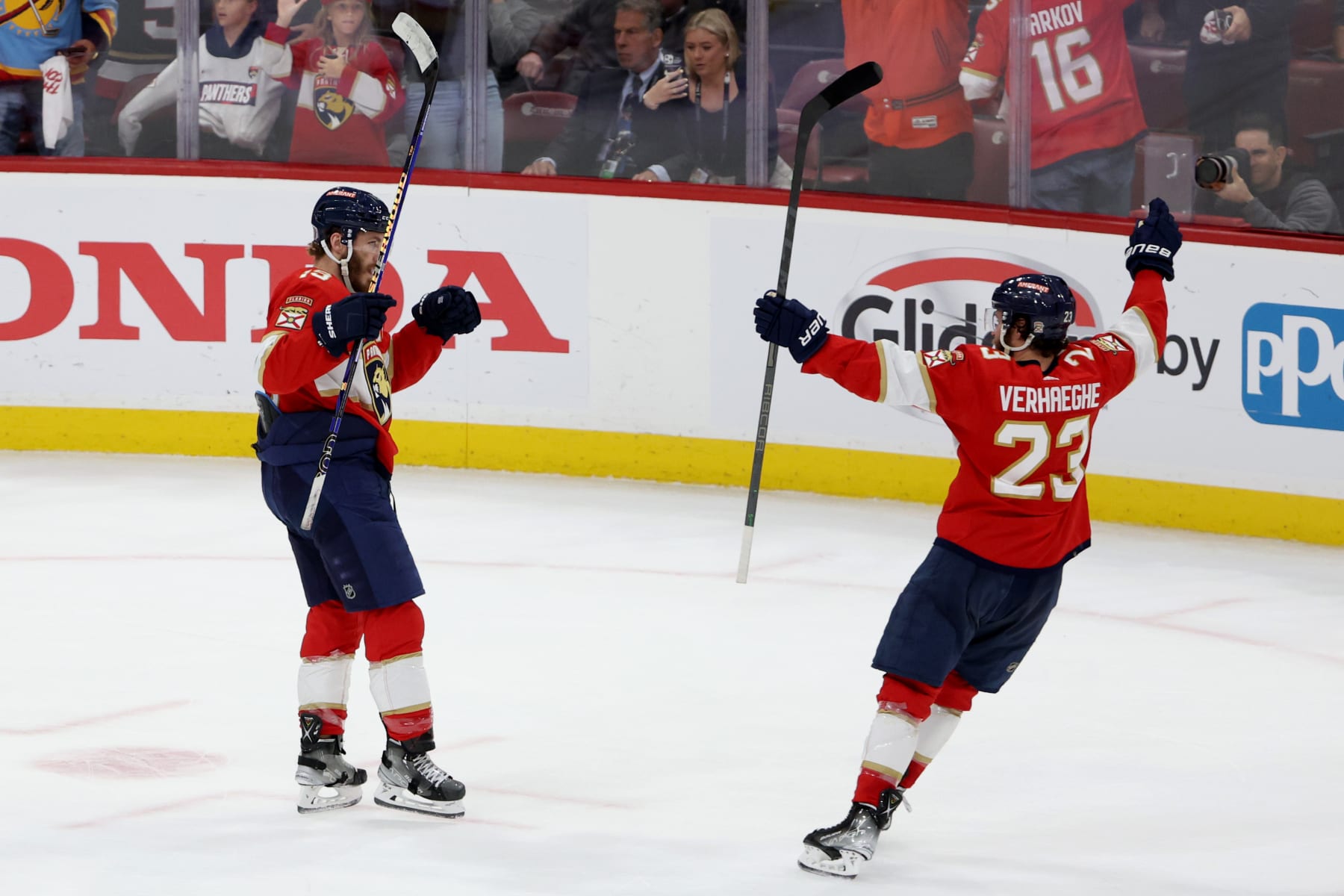 SUNRISE, FLORIDA - JUNE 08:  Matthew Tkachuk #19 of the Florida Panthers is congratulated by Carter Verhaeghe #23 after scoring a goal against the Vegas Golden Knights during the third period in Game Three of the 2023 NHL Stanley Cup Final at FLA Live Arena on June 08, 2023 in Sunrise, Florida. (Photo by Patrick Smith/Getty Images)