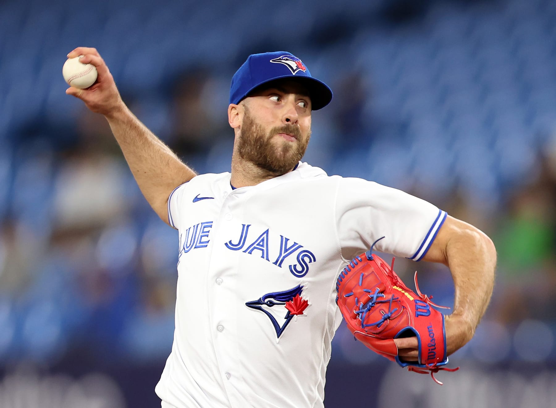 TORONTO, ON - APRIL 25:  Anthony Bass #52 of the Toronto Blue Jays delivers a pitch in the ninth inning against the Chicago White Sox at Rogers Centre on April 25, 2023 in Toronto, Ontario, Canada.  (Photo by Vaughn Ridley/Getty Images)