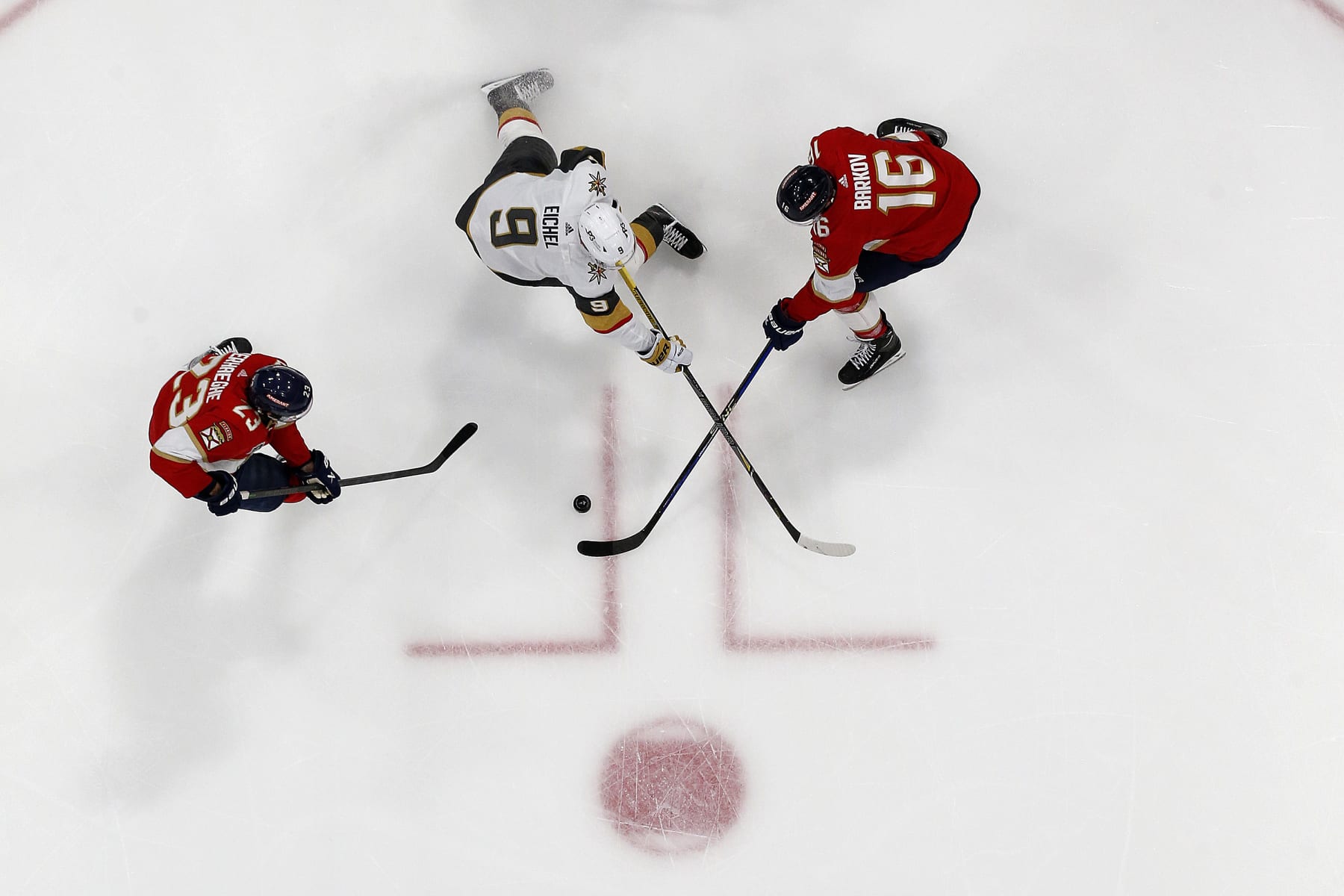 Jack Eichel of the Golden Knights and Aleksander Barkov of the Panthers