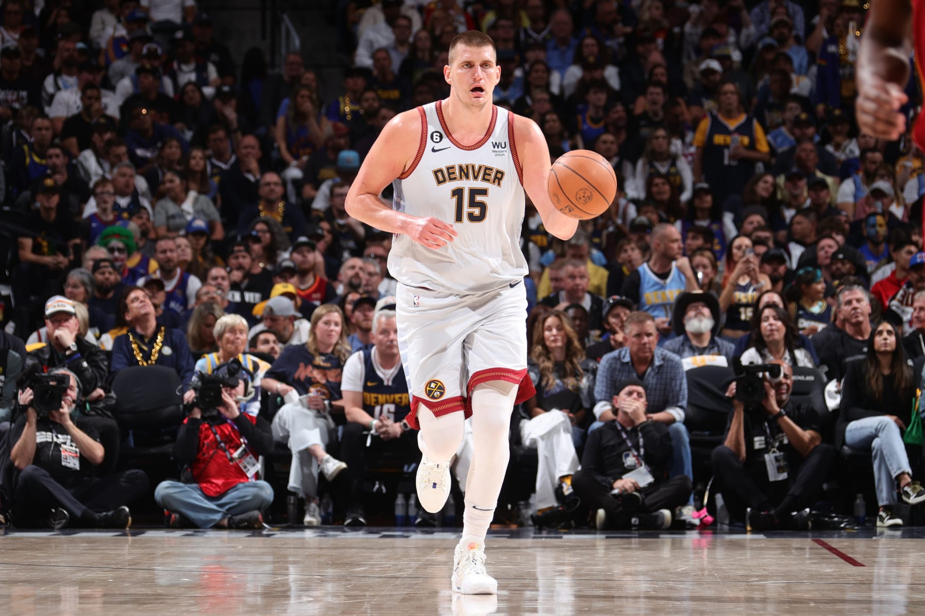 DENVER, CO - JUNE 12: Nikola Jokic #15 of the Denver Nuggets dribbles the ball during the game against the Miami Heat during Game Five of the 2023 NBA Finals on June 12, 2023 at Ball Arena in Denver, Colorado. NOTE TO USER: User expressly acknowledges and agrees that, by downloading and or using this Photograph, user is consenting to the terms and conditions of the Getty Images License Agreement. Mandatory Copyright Notice: Copyright 2023 NBAE (Photo by Nathaniel S. Butler/NBAE via Getty Images) DENVER, CO - JUNE 12: Nikola Jokic #15 of the Denver Nuggets dribbles the ball during the game against the Miami Heat during Game Five of the 2023 NBA Finals on June 12, 2023 at Ball Arena in Denver, Colorado. NOTE TO USER: User expressly acknowledges and agrees that, by downloading and or using this Photograph, user is consenting to the terms and conditions of the Getty Images License Agreement. Mandatory Copyright Notice: Copyright 2023 NBAE (Photo by Nathaniel S. Butler/NBAE via Getty Images)