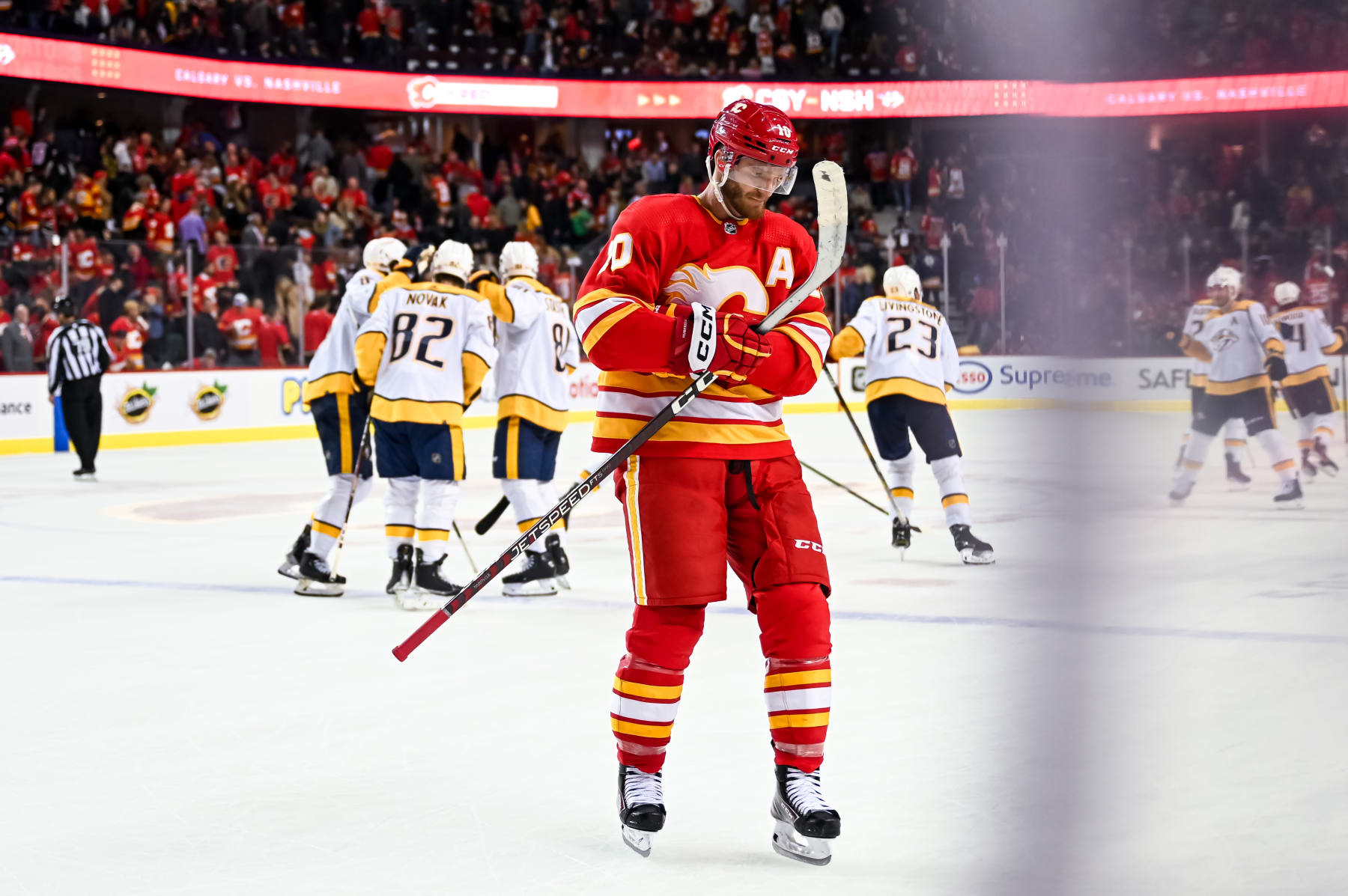 Nashville, Tennessee, USA. A young Nashville Predators fan swings