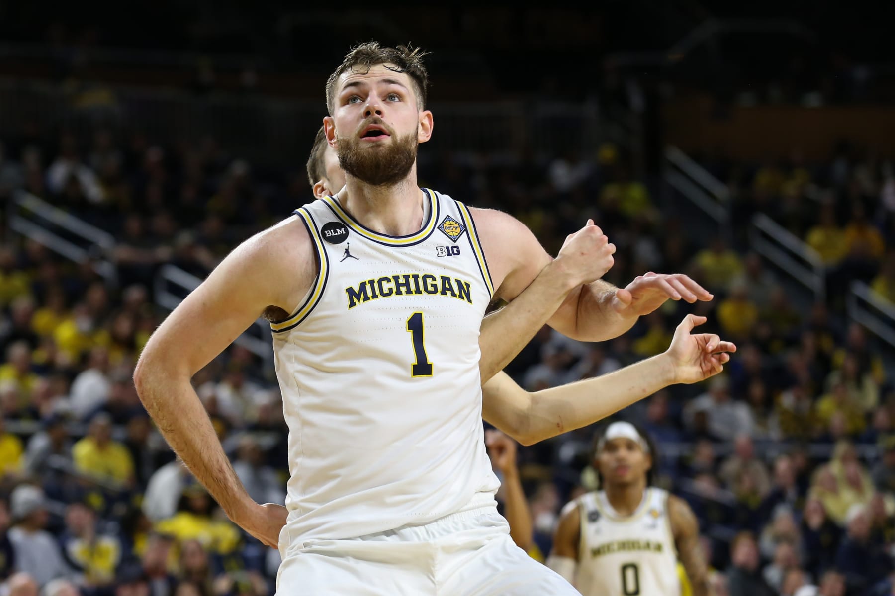 ANN ARBOR, MI - MARCH 14:   Michigan Wolverines center Hunter Dickinson (1) gets rebounding position during a first round basketball game of the National Invitational Tournament between the Toledo Rockets and the Michigan Wolverines on March 14, 2023 at the Crisler Center in Ann Arbor, Michigan.  (Photo by Scott W. Grau/Icon Sportswire via Getty Images)