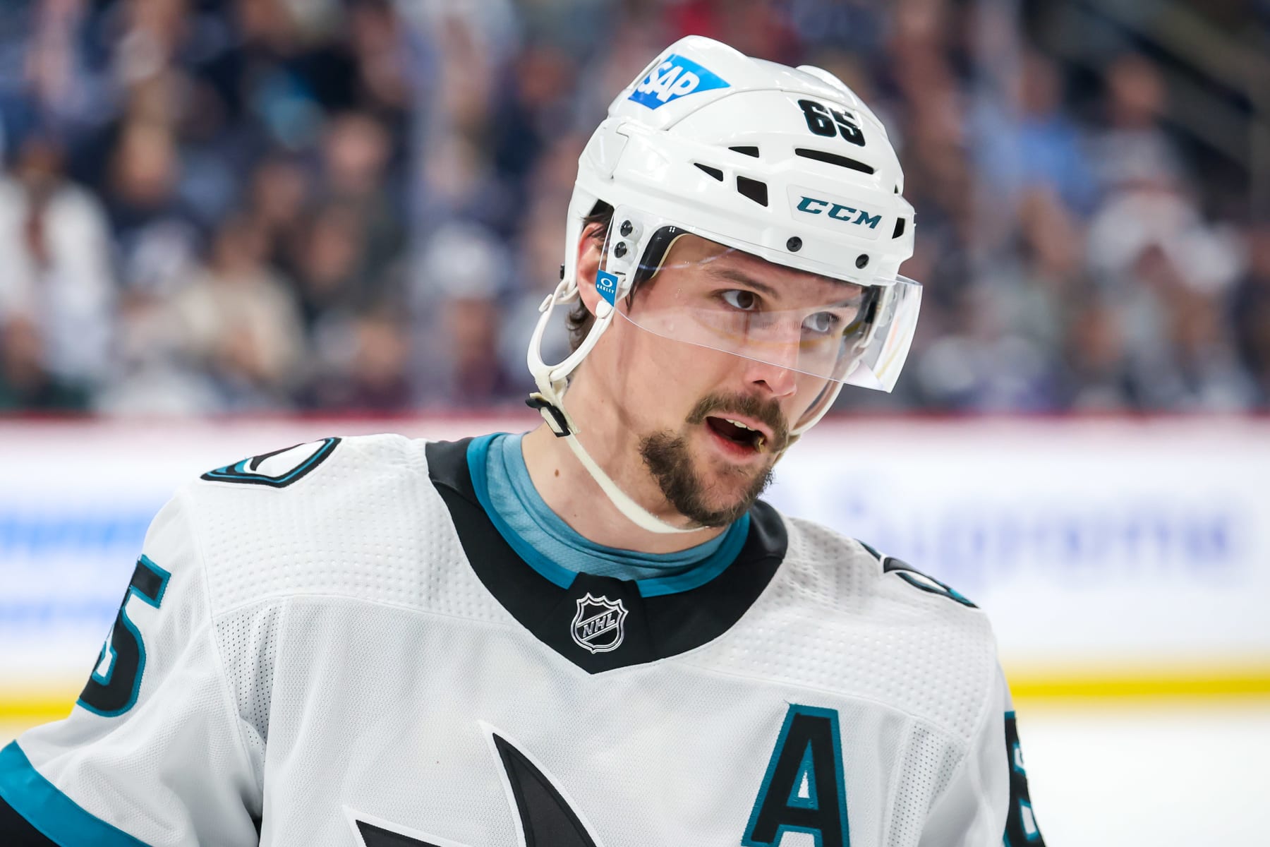 WINNIPEG, CANADA - APRIL 10: Erik Karlsson #65 of the San Jose Sharks looks on during a second period stoppage in play against the Winnipeg Jets at the Canada Life Centre on April 10, 2023 in Winnipeg, Manitoba, Canada. (Photo by Jonathan Kozub/NHLI via Getty Images)
