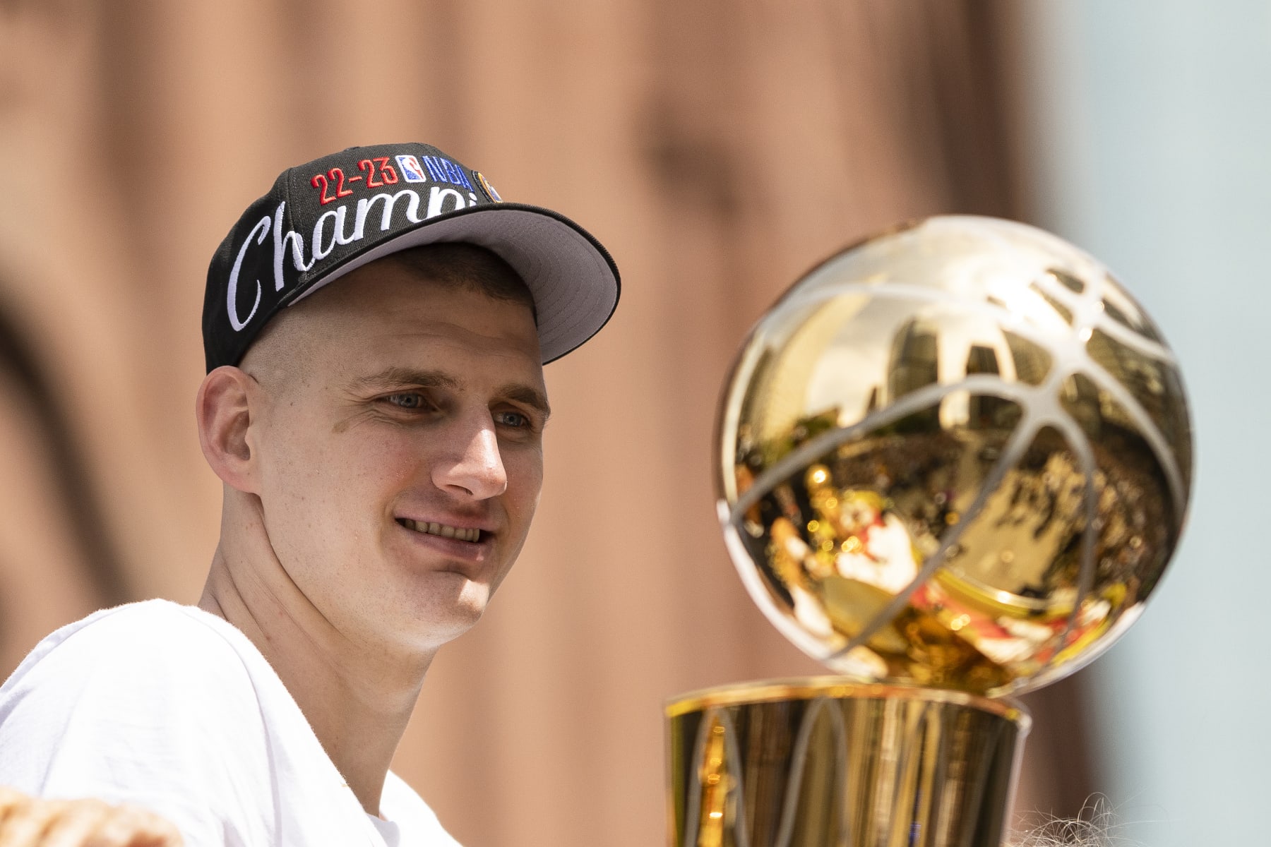 DENVER, CO - JUNE 15: Nikola Jokic #15 of the Denver Nuggets looks on during the 2023 Denver Nuggets Championship Parade on June 15, 2023 in Denver, Colorado. NOTE TO USER: User expressly acknowledges and agrees that, by downloading and/or using this Photograph, user is consenting to the terms and conditions of the Getty Images License Agreement. Mandatory Copyright Notice: Copyright 2023 NBAE (Photo by Ben Swanson/NBAE via Getty Images)