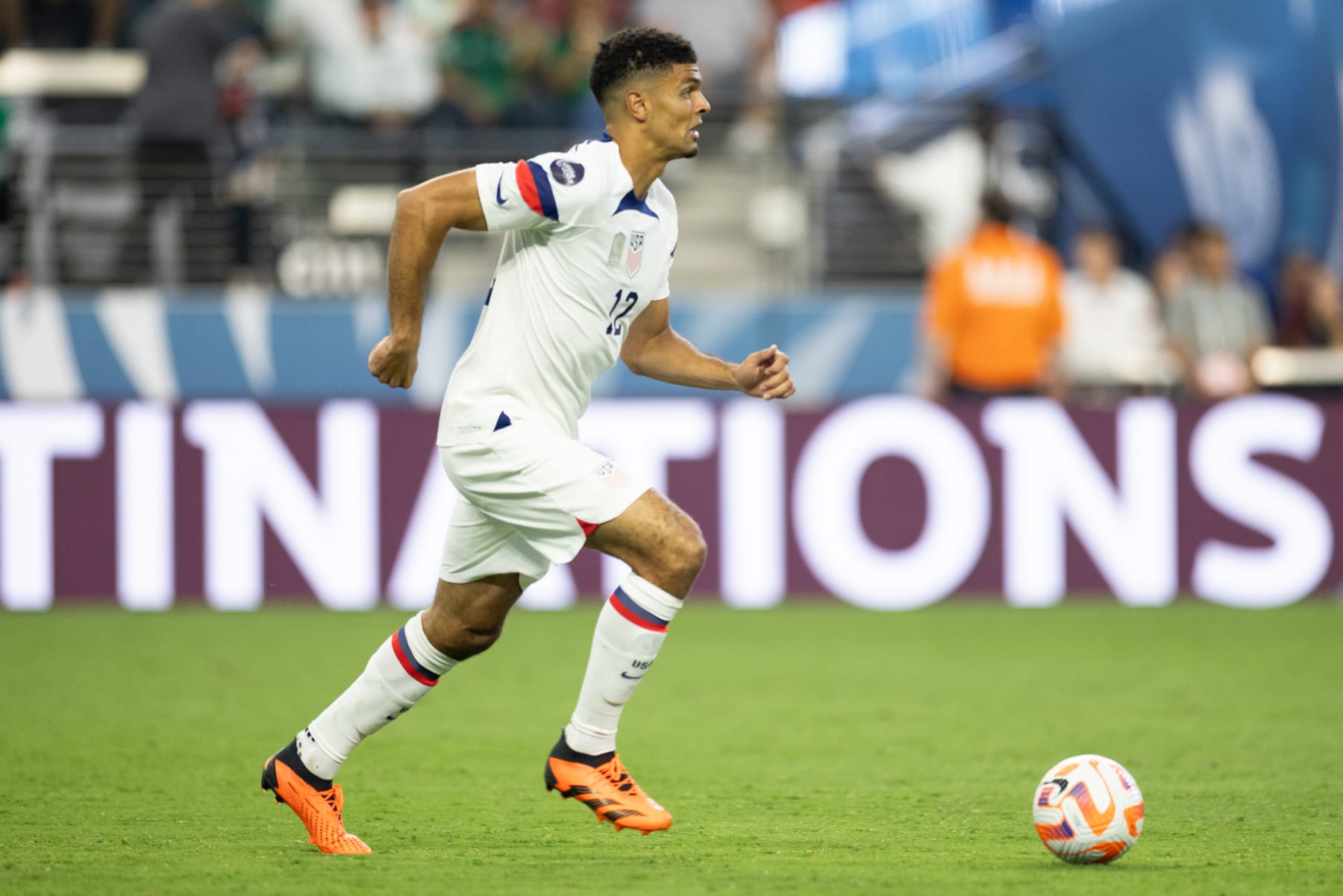 LAS VEGAS, NV - JUNE 15: Miles Robinson #12 of the United States moves with the ball during a game between Mexico and USMNT at Allegiant Stadium on June 15, 2023 in Las Vegas, Nevada. (Photo by John Dorton/USSF/Getty Images for USSF)