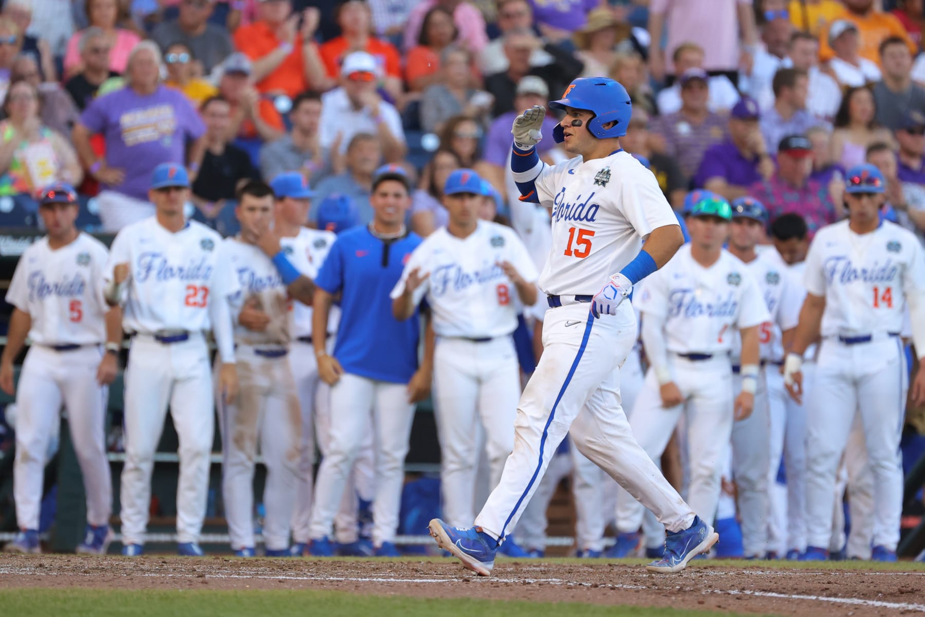 OMAHA, NE - JUNE 24: BT Riopelle #15 of the Florida Gators reacts to hitting a home run against the LSU Tigers during game one of the Division I Men's Baseball Championship held at Charles Schwab Field on June 24, 2023 in Omaha, Nebraska. (Photo by C. Morgan Engel/NCAA Photos via Getty Images)