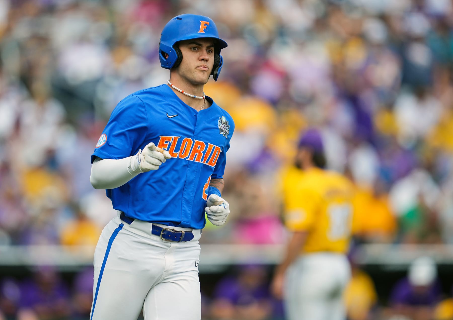 OMAHA, NEBRASKA - JUNE 25: Ty Evans #2 of the Florida Gators gestures to the dugout after hitting a home run against the LSU Tigers during the second inning of Game 2 of the NCAA College World Series baseball finals at Charles Schwab Field on June 25, 2023 in Omaha, Nebraska. (Photo by Jay Biggerstaff/Getty Images)