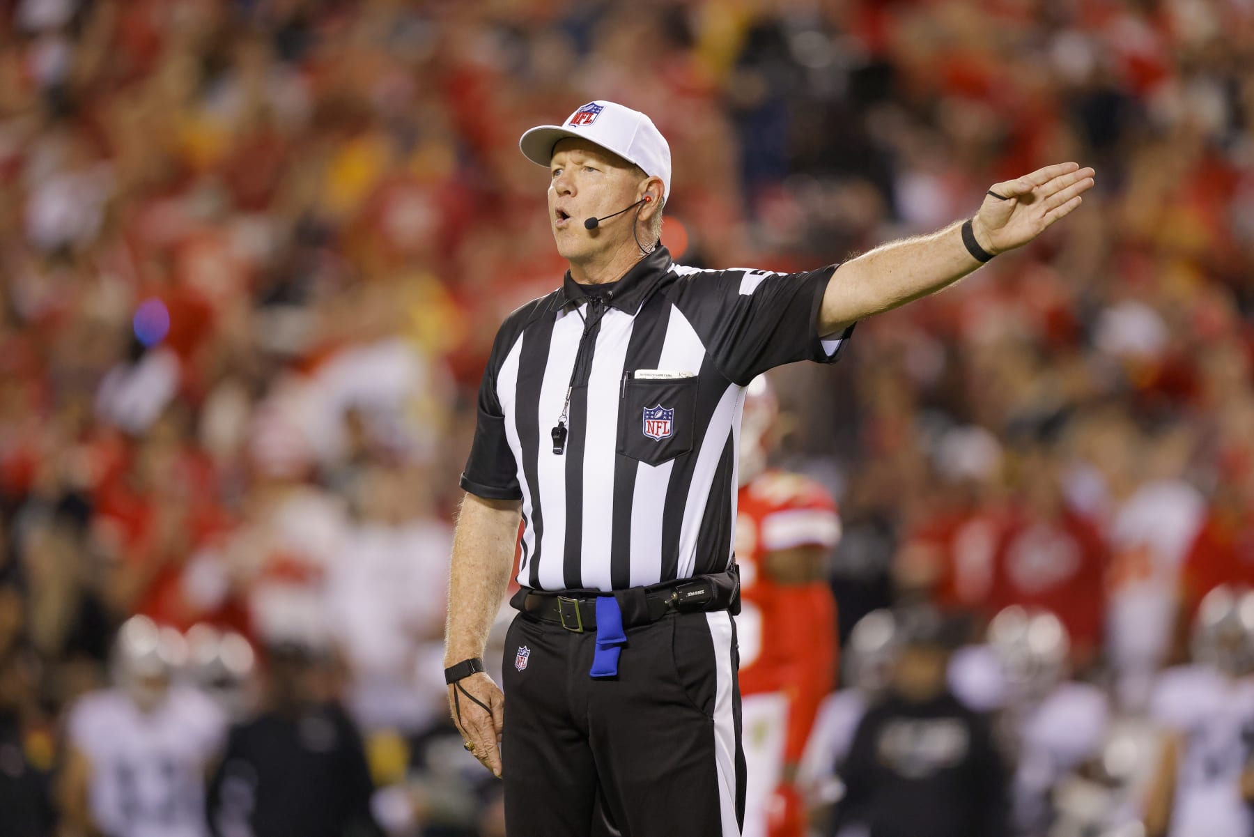 Line judge Robin Delorenzo officiates in the first half in the