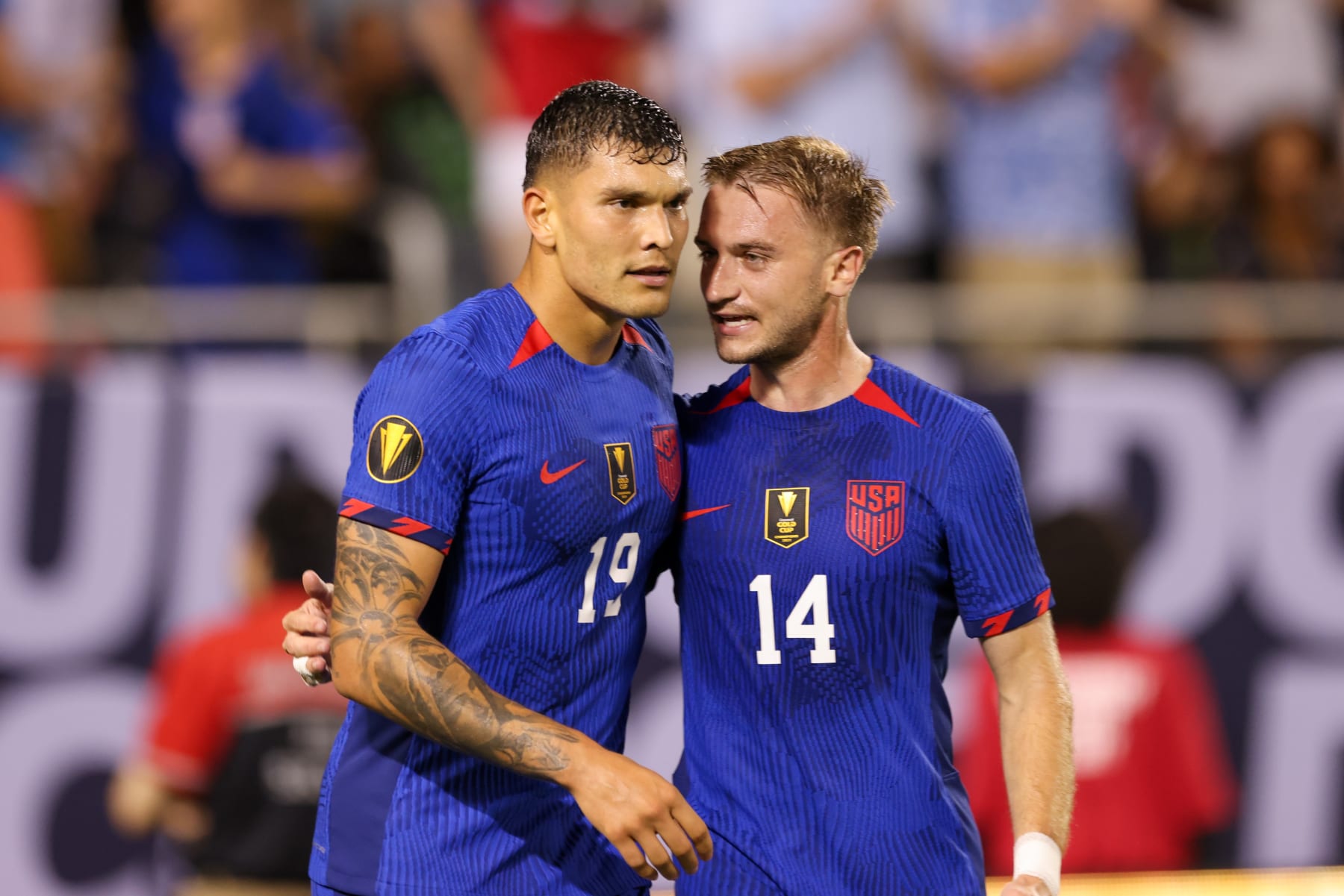 CHICAGO, ILLINOIS - JUNE 24: Brandon Vazquez #19 of the United States celebrates scoring with Djordje Mihailovic #14 during their Group A match of the 2023 CONCACAF Gold Cup at Soldier Field on June 24, 2023 in Chicago, Illinois. (Photo by John Dorton/USSF/Getty Images for USSF)