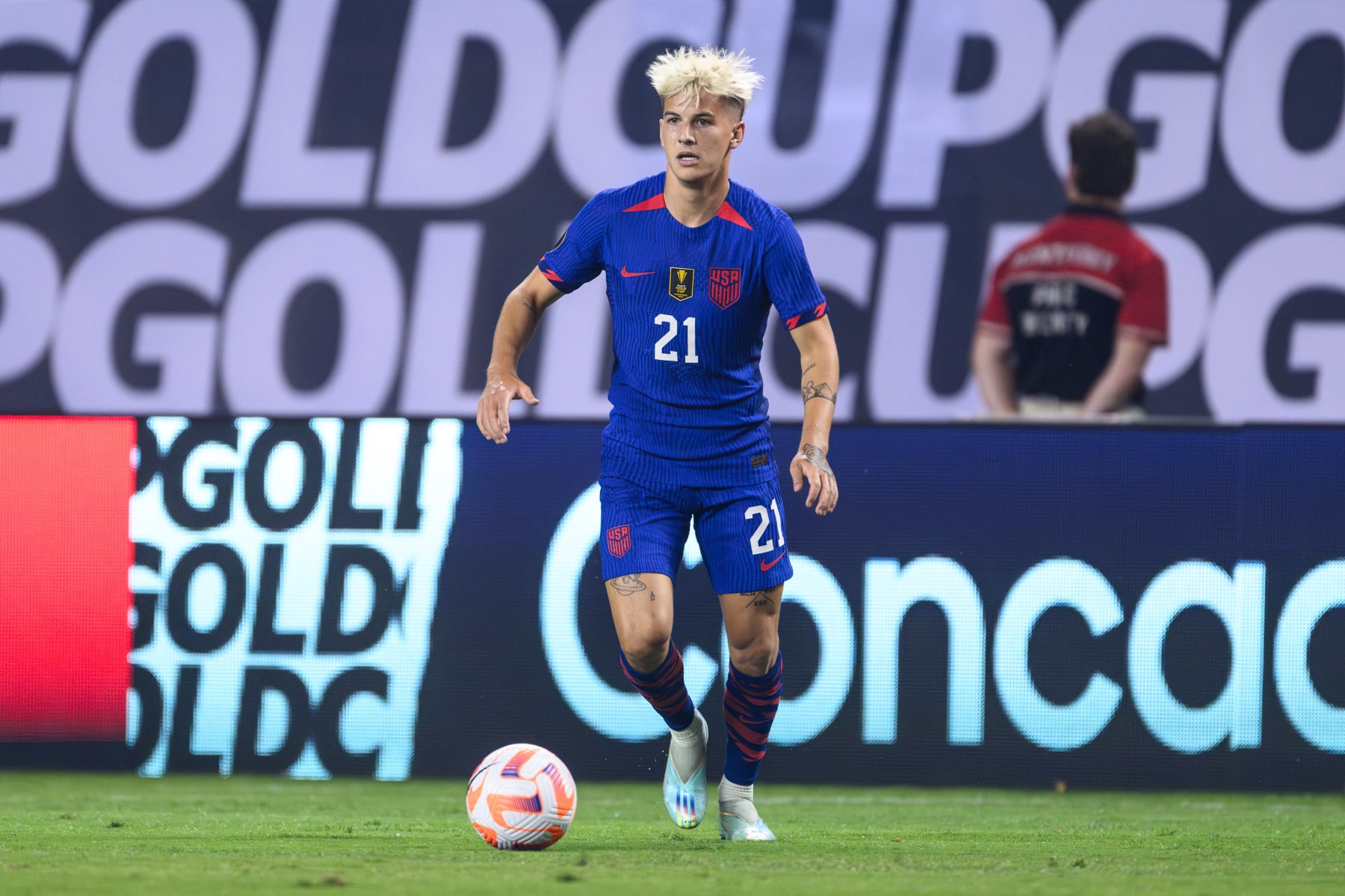 CHICAGO, IL - JUNE 24: John Tolkin #21 of the United States plays the ball during a game between Jamaica and USMNT at Soldier Field on June 24, 2023 in Chicago, Illinois. (Photo by Daniel Bartel/ISI Photos/Getty Images)