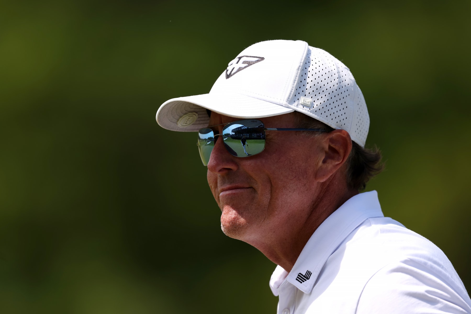 STERLING, VIRGINIA - MAY 27: Phil Mickelson of HyFlyers GC 
looks on from the 18th green during day two of the LIV Golf Invitational - DC at Trump National Golf Club on May 27, 2023 in Sterling, Virginia. (Photo by Rob Carr/Getty Images)