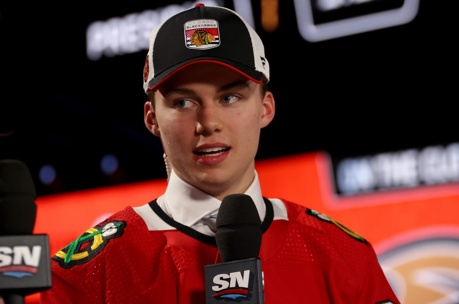 NASHVILLE, TENNESSEE - JUNE 28: Connor Bedard speaks during an interview after being selected first overall by the Chicago Blackhawks during the 2023 Upper Deck NHL Draft - Round One at Bridgestone Arena on June 28, 2023 in Nashville, Tennessee. (Photo by Dave Sandford/NHLI via Getty Images)