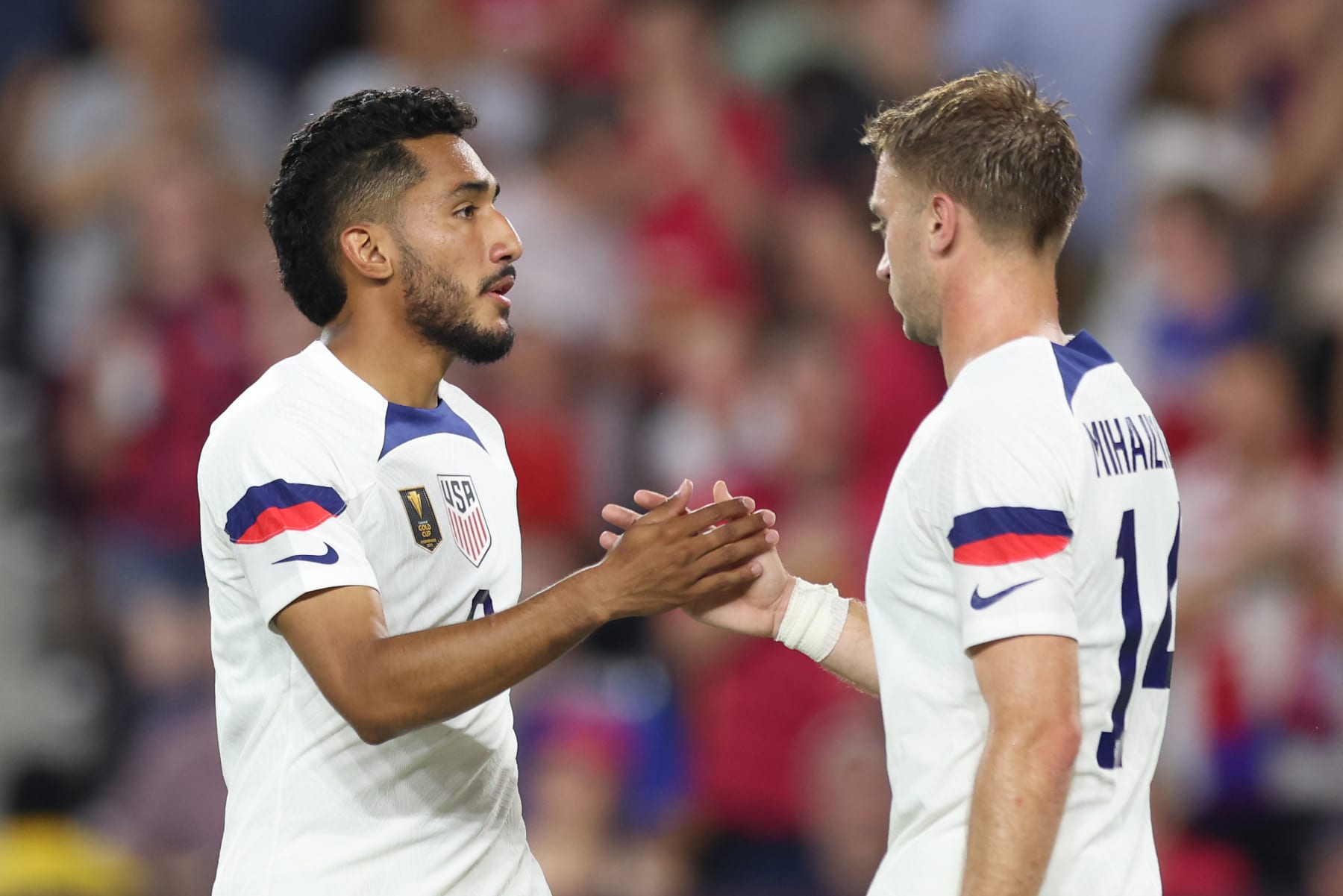 ST LOUIS, MISSOURI - JUNE 28: Jesús Ferreira #9 of the United States celebrates scoring with Djordje Mihailovic #14 during the second half of a Group A match of the 2023 CONCACAF Gold Cup against Saint Kitts and Nevis at CITYPARK on June 28, 2023 in St Louis, Missouri. (Photo by John Dorton/USSF/Getty Images for USSF)