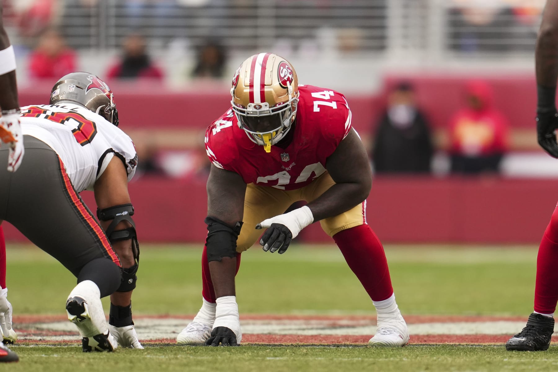 San Francisco 49ers offensive tackle Spencer Burford (74) blocks