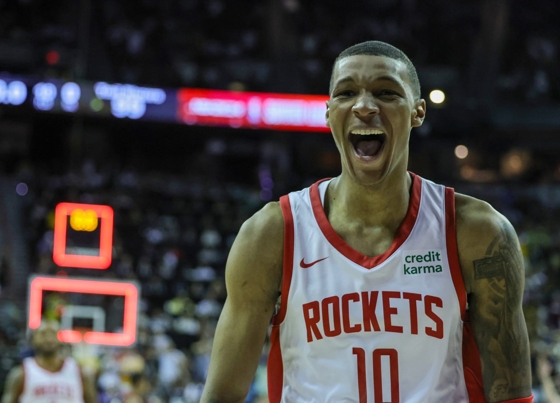 LAS VEGAS, NEVADA - JULY 07: Jabari Smith Jr. #10 of the Houston Rockets celebrates after hitting a game-winning 3-pointer against the Portland Trail Blazers with under a second left in a 2023 NBA Summer League game at the Thomas & Mack Center on July 07, 2023 in Las Vegas, Nevada. NOTE TO USER: User expressly acknowledges and agrees that, by downloading and or using this photograph, User is consenting to the terms and conditions of the Getty Images License Agreement. (Photo by Ethan Miller/Getty Images)