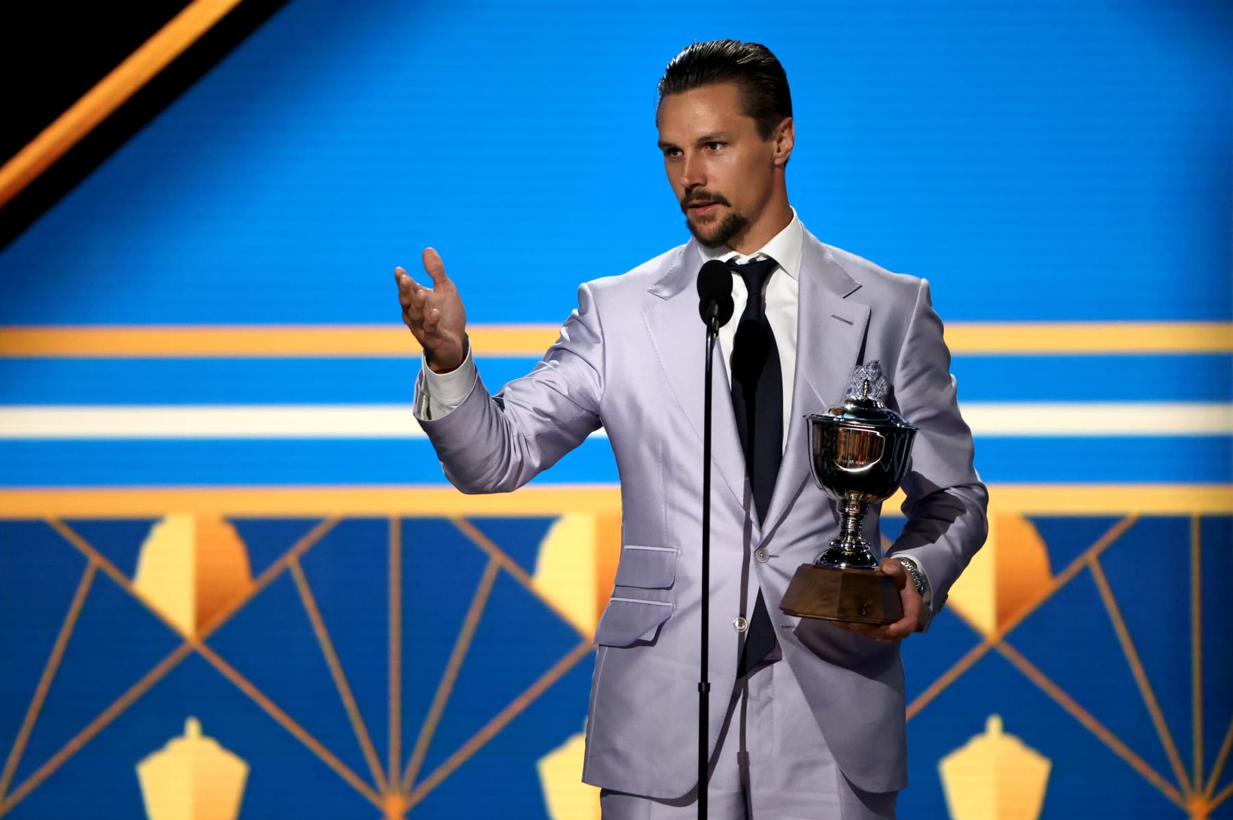 NASHVILLE, TENNESSEE - JUNE 26: Erik Karlsson of the San Jose Sharks speaks onstage after being awarded the James Norris Memorial Trophy at the 2023 NHL Awards at Bridgestone Arena on June 26, 2023 in Nashville, Tennessee. (Photo by Dave Sandford/NHLI via Getty Images)