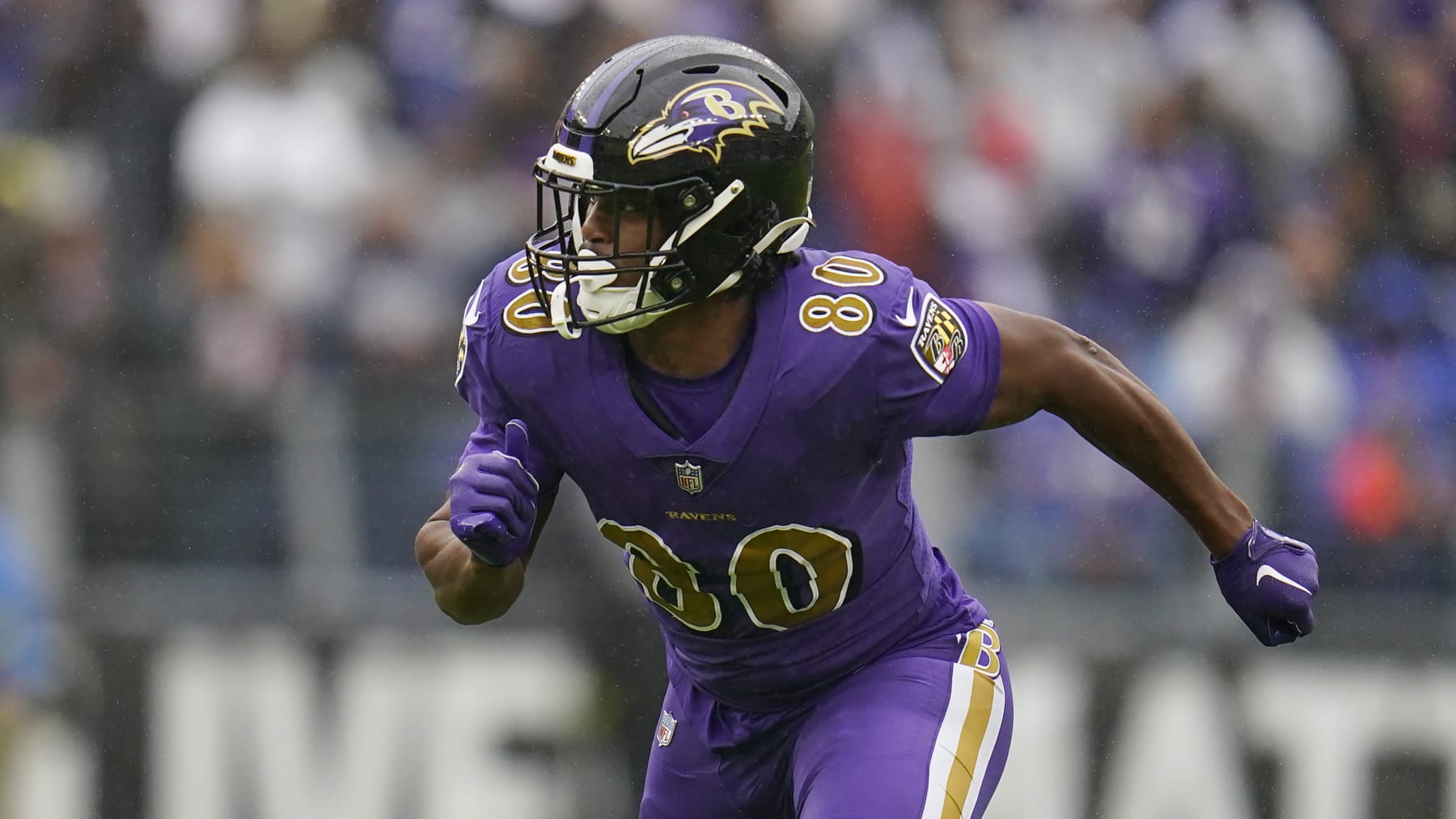 Baltimore Ravens tight end Isaiah Likely (80) runs with the ball