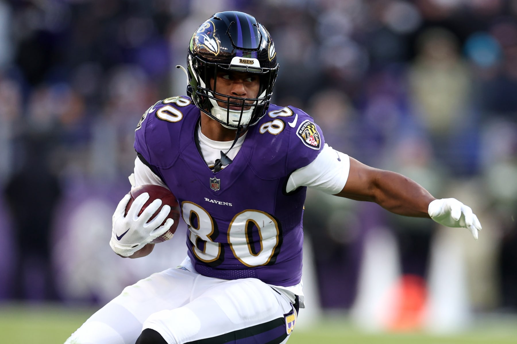 Baltimore Ravens tight end Isaiah Likely (80) attempts to catch a