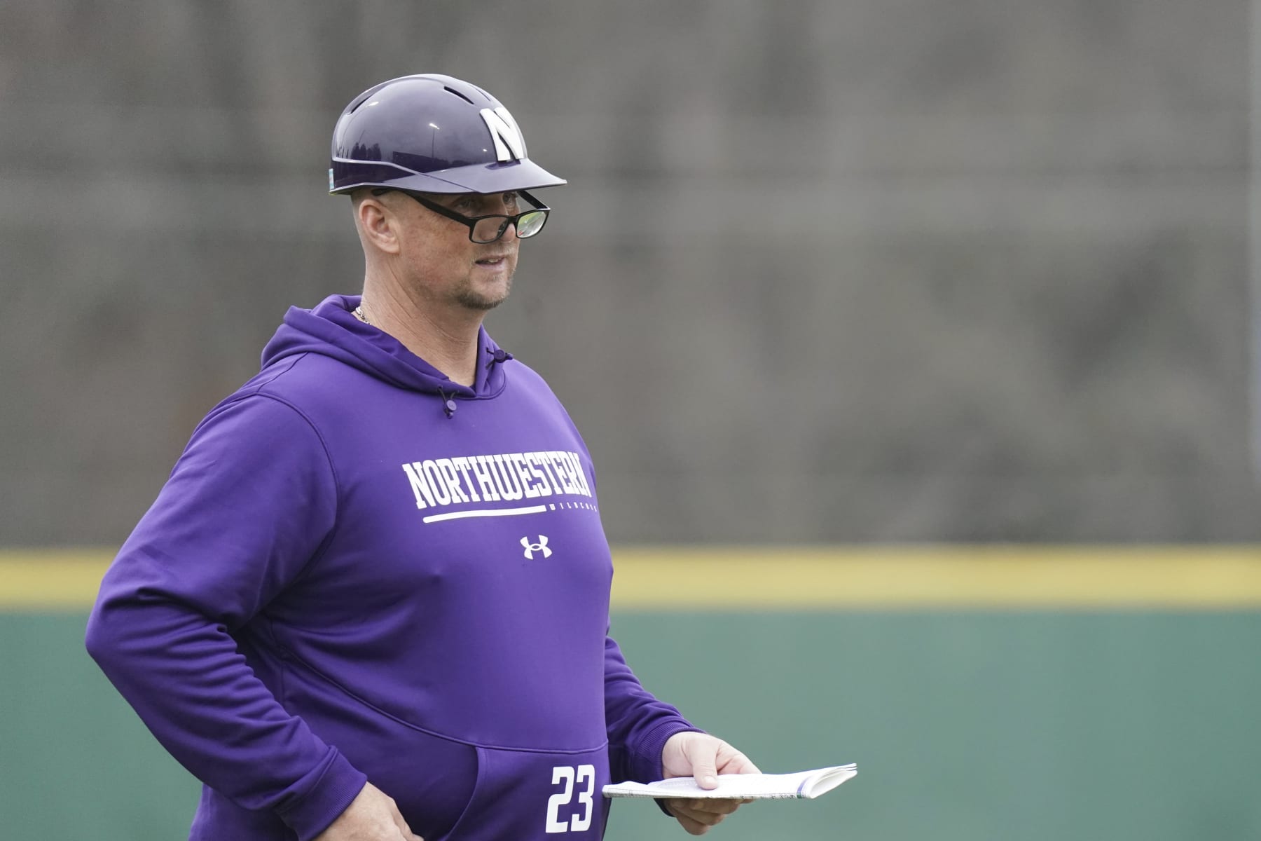 Northwestern head coach Jim Foster looks on from the third base box during an NCAA baseball game against USC Upstate on Sunday, Feb. 26, 2023, in Spartanburg, S.C. USC Upstate won 9-0. (AP Photo/Sean Rayford)