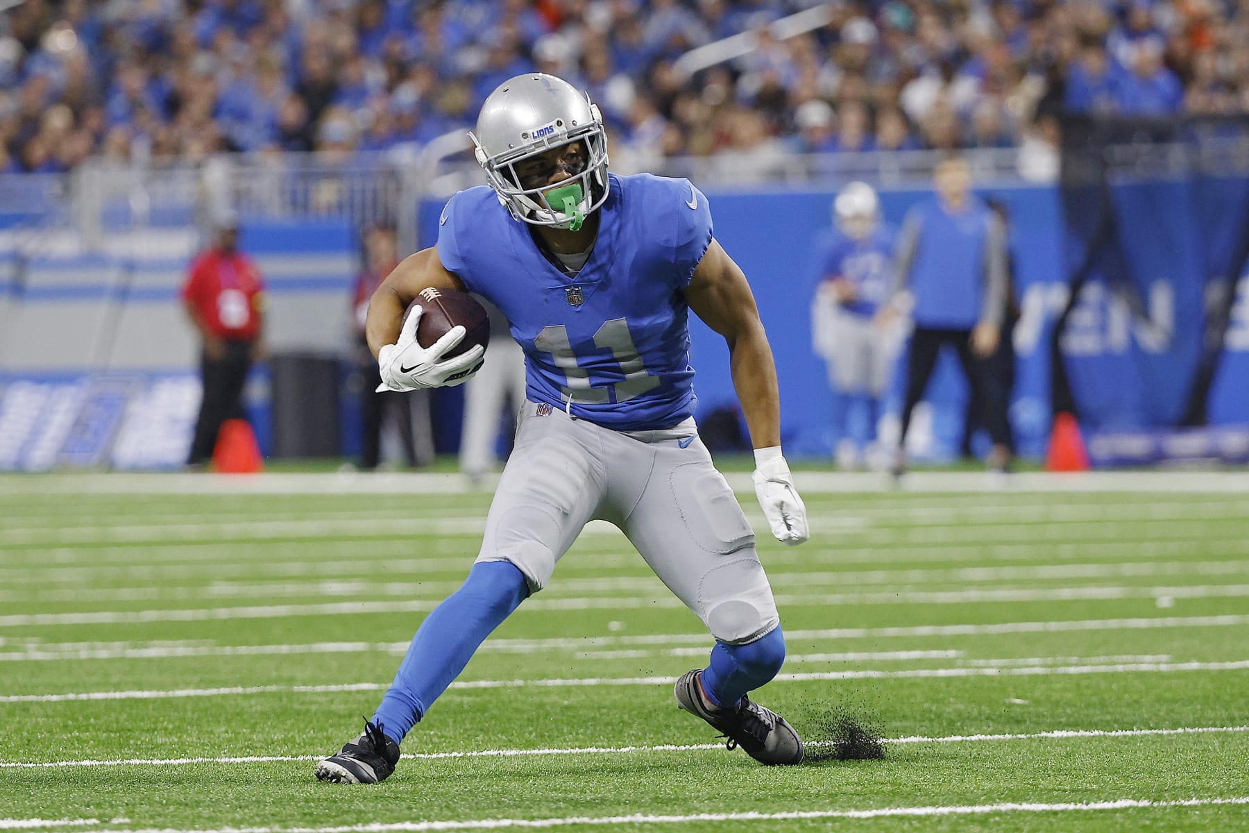 DETROIT, MICHIGAN - JANUARY 01: Kalif Raymond #11 of the Detroit Lions runs up the field in the first half of a game against the Chicago Bears at Ford Field on January 01, 2023 in Detroit, Michigan. (Photo by Mike Mulholland/Getty Images) DETROIT, MICHIGAN - JANUARY 01: Kalif Raymond #11 of the Detroit Lions runs up the field in the first half of a game against the Chicago Bears at Ford Field on January 01, 2023 in Detroit, Michigan. (Photo by Mike Mulholland/Getty Images)