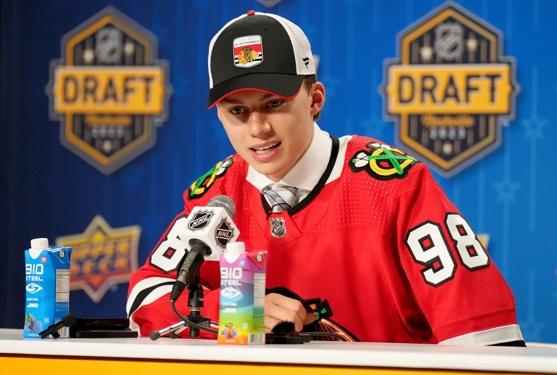 NASHVILLE, TENNESSEE - JUNE 28: Connor Bedard speaks during an interview after being selected first overall by the Chicago Blackhawks during the 2023 Upper Deck NHL Draft - Round One at Bridgestone Arena on June 28, 2023 in Nashville, Tennessee. (Photo by John Russell/NHLI via Getty Images)
