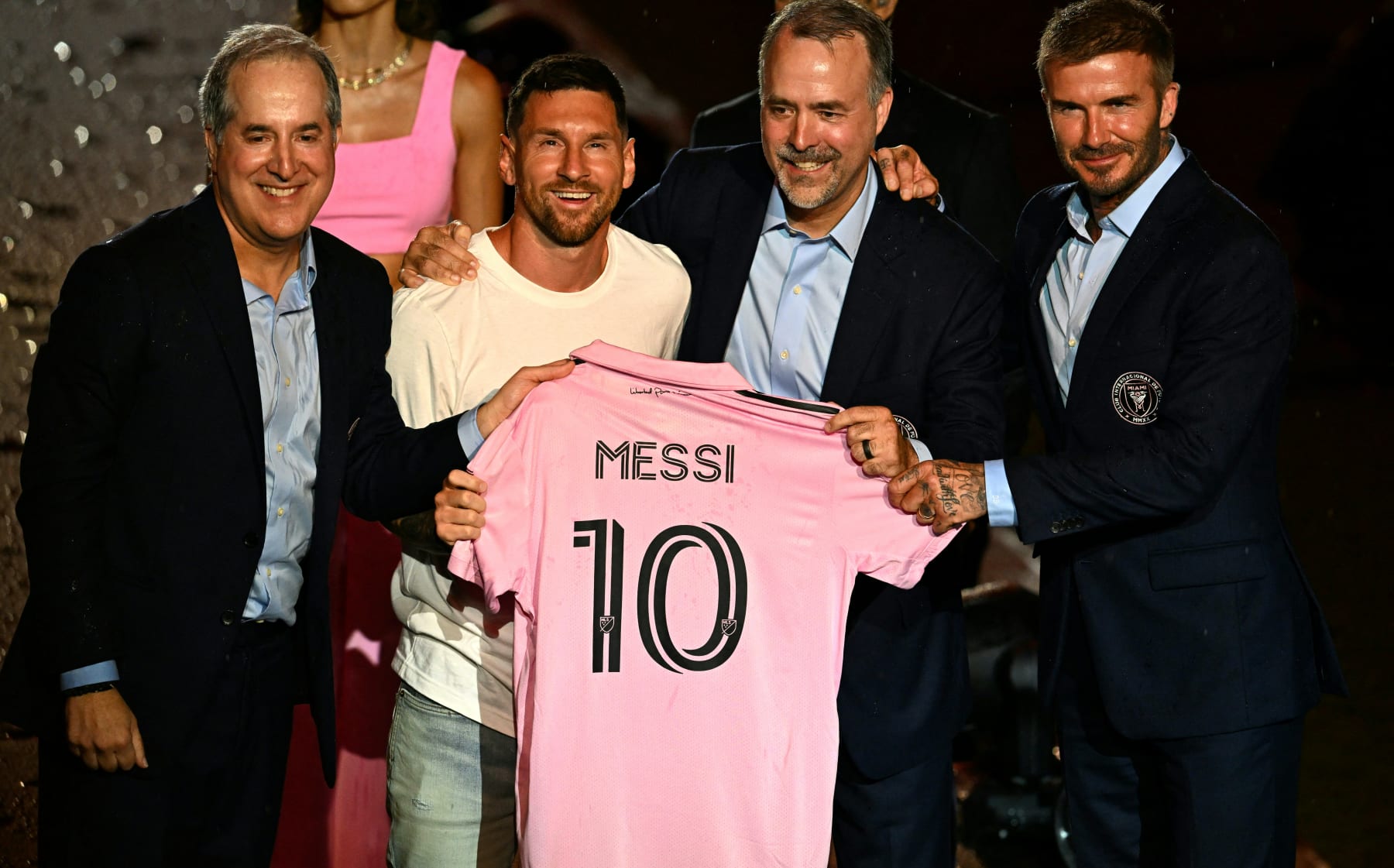 Argentine soccer star Lionel Messi (2nd L) is presented by (from R) owners of Inter Miami CF David Beckham, Jose R. Mas and Jorge Mas as the newest player for Major League Soccer's Inter Miami CF, at DRV PNK Stadium in Fort Lauderdale, Florida, on July 16, 2023. (Photo by CHANDAN KHANNA / AFP) (Photo by CHANDAN KHANNA/AFP via Getty Images)