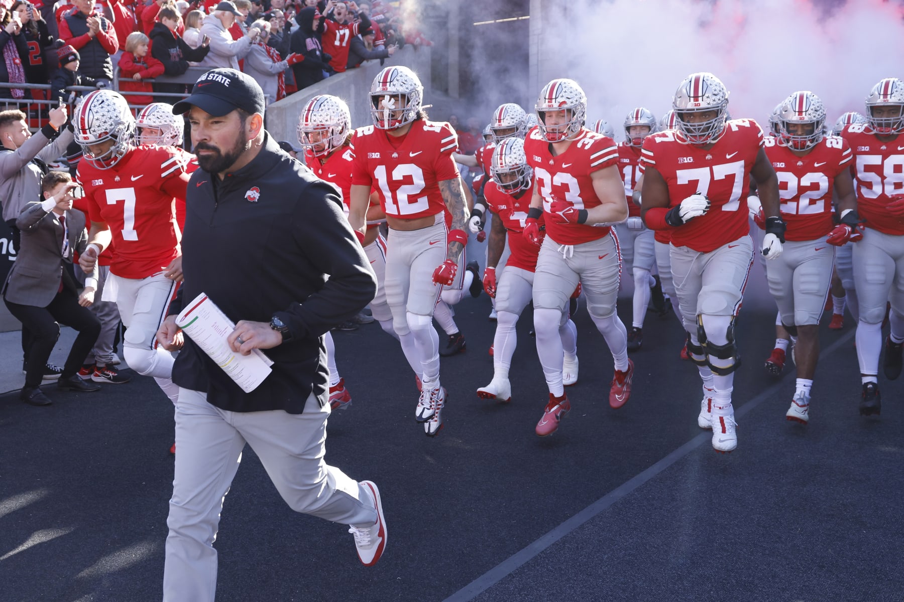 COLUMBUS, OH - NOVEMBER 26: Ohio State Buckeyes players run onto the field behind head coach Ryan Day prior to a college football game against the Michigan Wolverines on November 26, 2022 at Ohio Stadium in Columbus, Ohio. (Photo by Joe Robbins/Icon Sportswire via Getty Images)