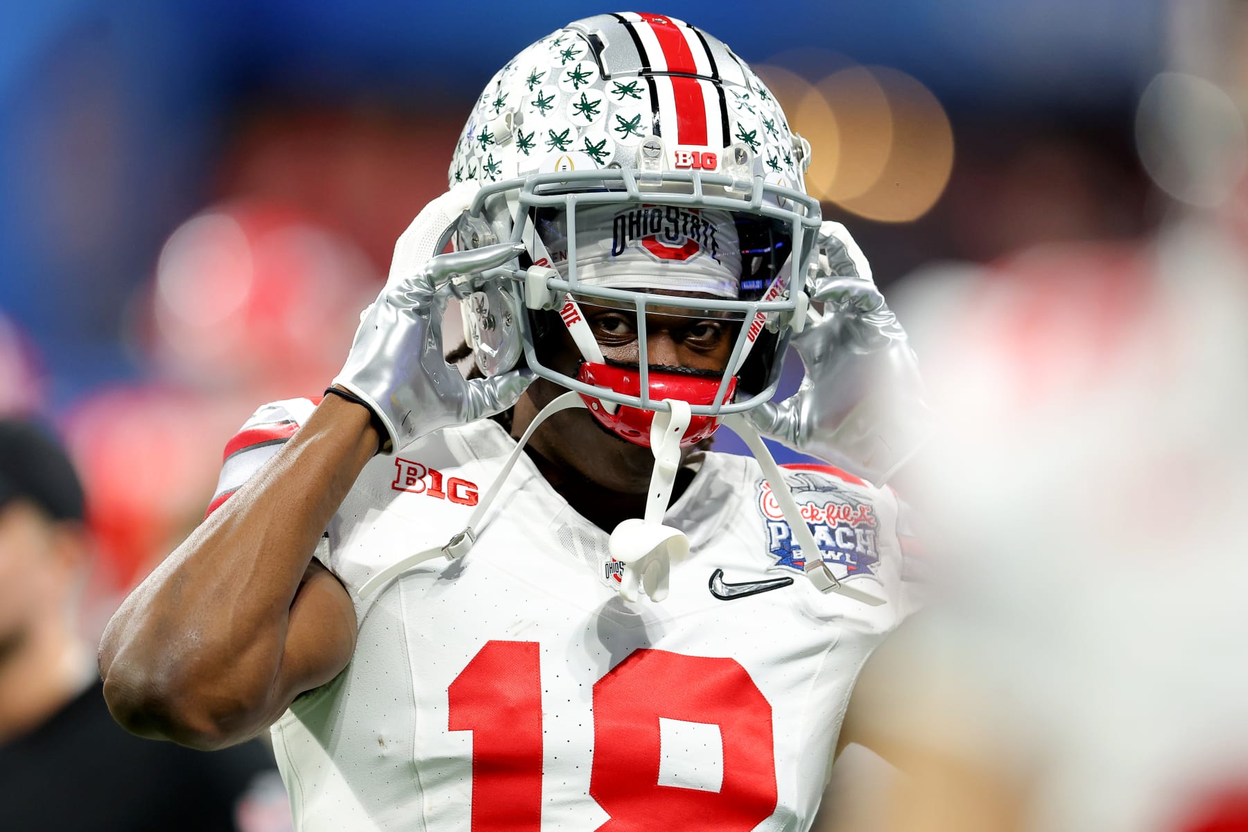 ATLANTA, GEORGIA - DECEMBER 31: Marvin Harrison Jr. #18 of the Ohio State Buckeyes warms up prior to a game against the Georgia Bulldogs in the Chick-fil-A Peach Bowl at Mercedes-Benz Stadium on December 31, 2022 in Atlanta, Georgia. (Photo by Kevin C. Cox/Getty Images)