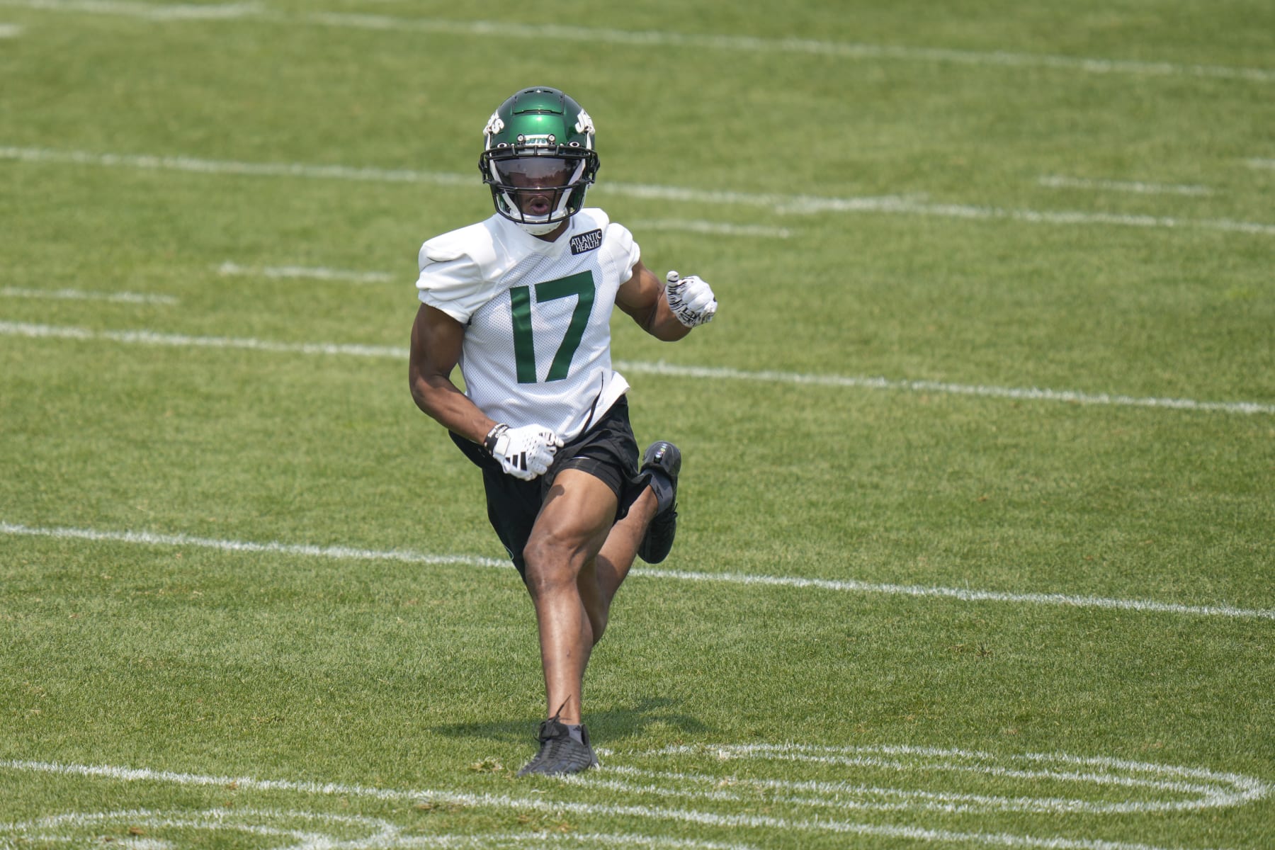 New York Jets' Garrett Wilson participates in a drill at the NFL football team's training facility in Florham Park, N.J., Tuesday, June 6, 2023. (AP Photo/Seth Wenig)