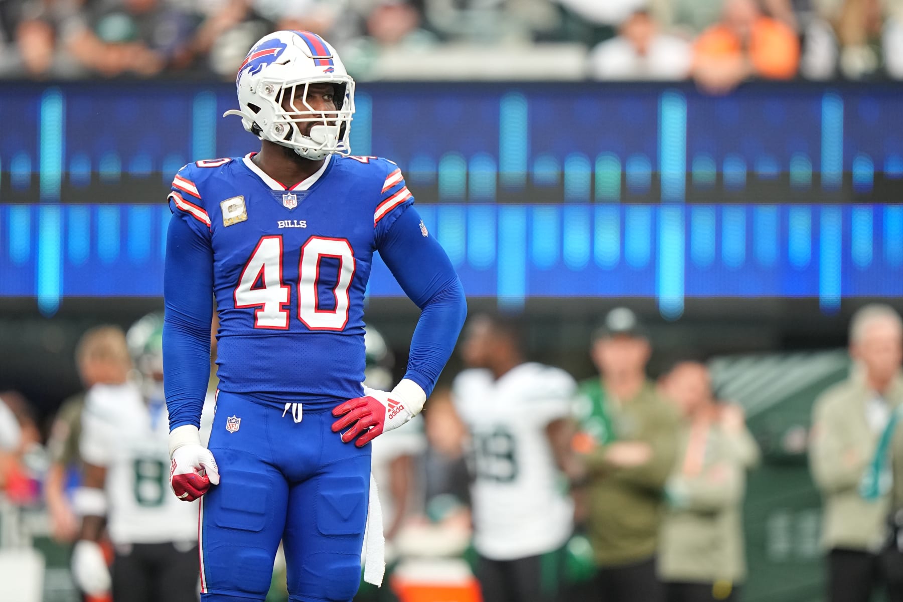 New York Jets' James Robinson (23) dives past Buffalo Bills' Tim