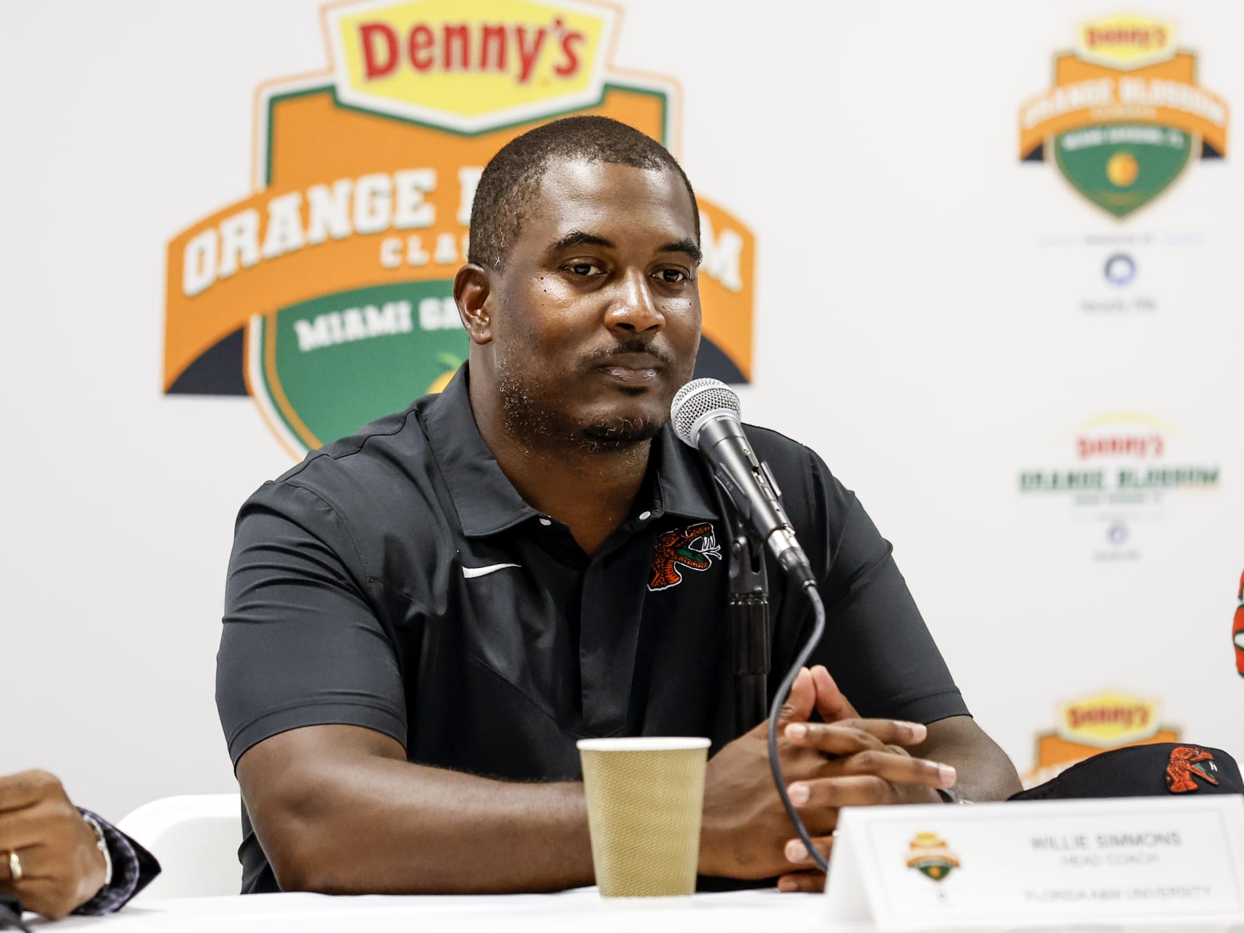 MIAMI GARDENS, FLORIDA - SEPTEMBER 04: Head Coach Willie Simmons of the Florida A&M Rattlers talk with the media during the post game press conference after the game against the Jackson State Tigers during the Denny's Orange Blossom Classic Game at Hard Rock Stadium on September 04, 2022 in Miami Gardens, Florida. The Tigers defeated the Rattlers 59 to 3. (Photo by Don Juan Moore/Getty Images)