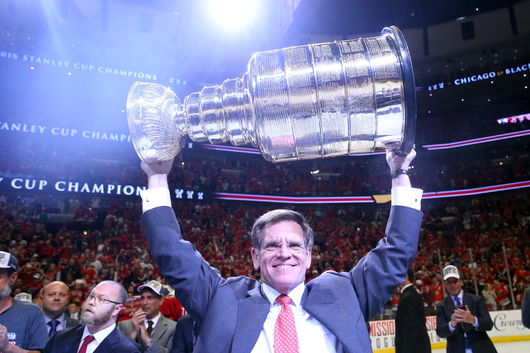 CHICAGO, IL - JUNE 15:  Owner and Chairman Rocky Wirtz of the Chicago Blackhawks celebrates by hoisting the Stanley Cup after defeating the Tampa Bay Lightning  by a score of 2-0 in Game Six to win the 2015 NHL Stanley Cup Final at the United Center  on June 15, 2015 in Chicago, Illinois.  (Photo by Bruce Bennett/Getty Images)