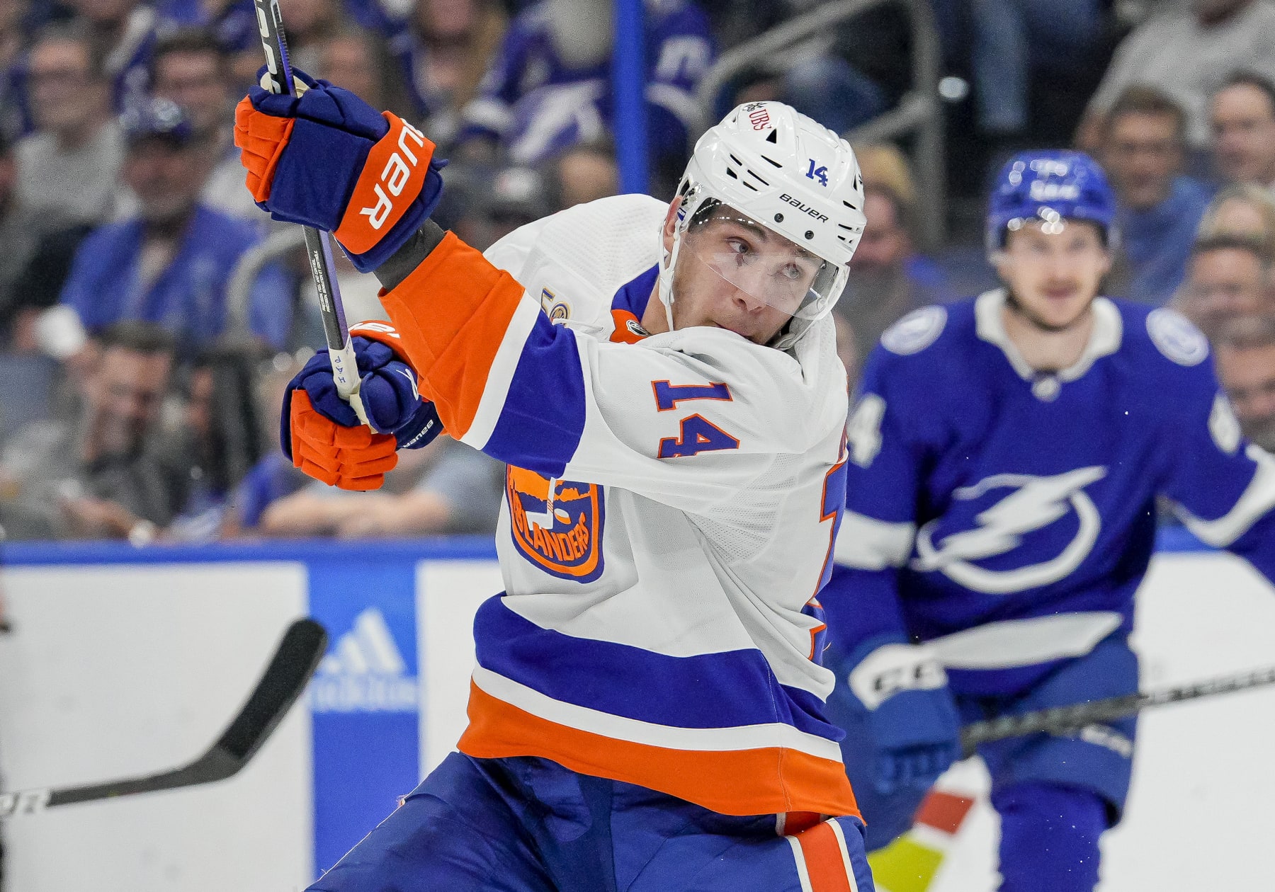 TAMPA, FL - APRIL 01: New York Islanders center Bo Horvat (14) shoots the puck during the NHL Hockey match between the Tampa Bay Lightning and New York Islanders on April 1st 2023 at Amalie Arena in Tampa, FL. (Photo by Andrew Bershaw/Icon Sportswire via Getty Images)