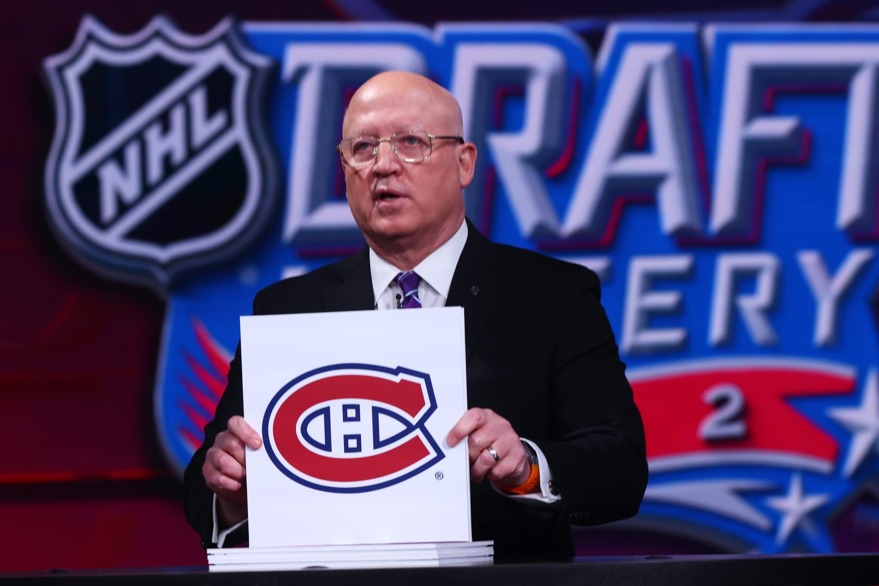 SECAUCUS, NEW JERSEY - MAY 10: National Hockey League Deputy Commissioner Bill Daly announces the Montreal Canadiens #1 overall draft position during the 2022 NHL Draft Lottery on May 10, 2022 at the NHL Network's studio in Secaucus, New Jersey. (Photo by Mike Stobe/NHLI via Getty Images)