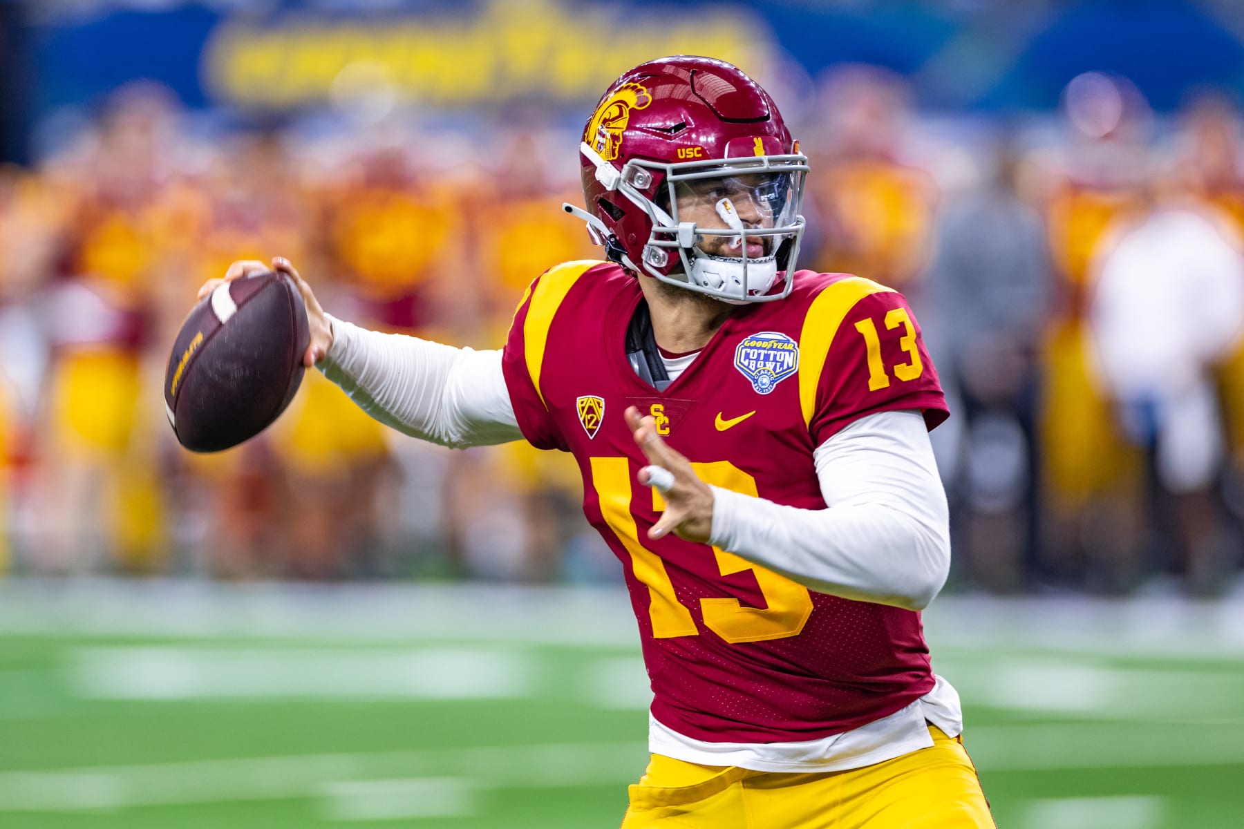 ARLINGTON, TX - JANUARY 02: USC Trojans quarterback Caleb Williams (#13) throws a pass during the Goodyear Cotton Bowl game between the USC Trojans and Tulane Green Wave on January 02, 2023 at AT&T Stadium in Arlington, TX.  (Photo by Matthew Visinsky/Icon Sportswire via Getty Images)