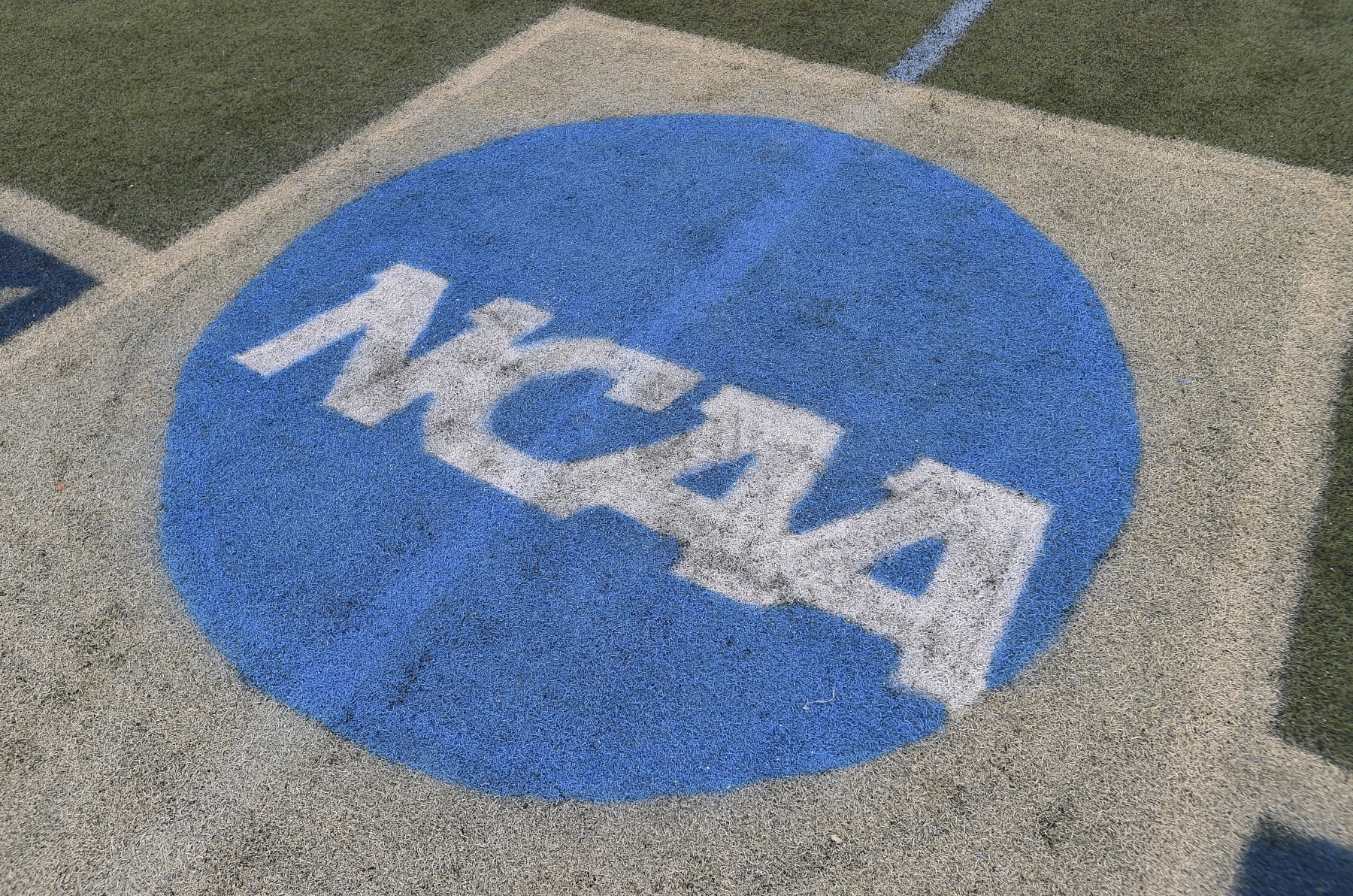 BALTIMORE, MD - MAY 27: The NCAA logo on the field before the game between the North Carolina Tar Heels and the Northwestern Wildcats during the Division I Womens Lacrosse Semifinals held at Homewood Field on May 27, 2022 in Baltimore, Maryland. (Photo by Greg Fiume/NCAA Photos via Getty Images)