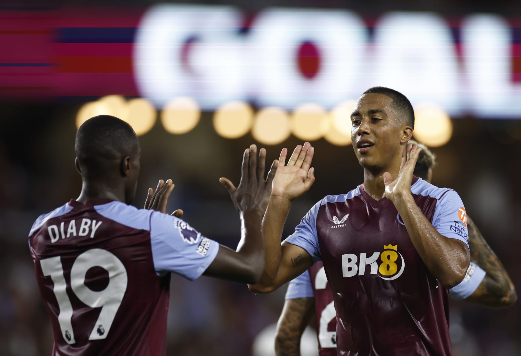 ORLANDO, FLORIDA - JULY 26: Moussa Diaby of Aston Villa celebrates with teammate Youri Tielemans after scoring the teams second goal during the Premier League Summer Series match between Aston Villa and Fulham FC at Exploria Stadium on July 26, 2023 in Orlando, Florida. (Photo by James Gilbert/Getty Images for Premier League)