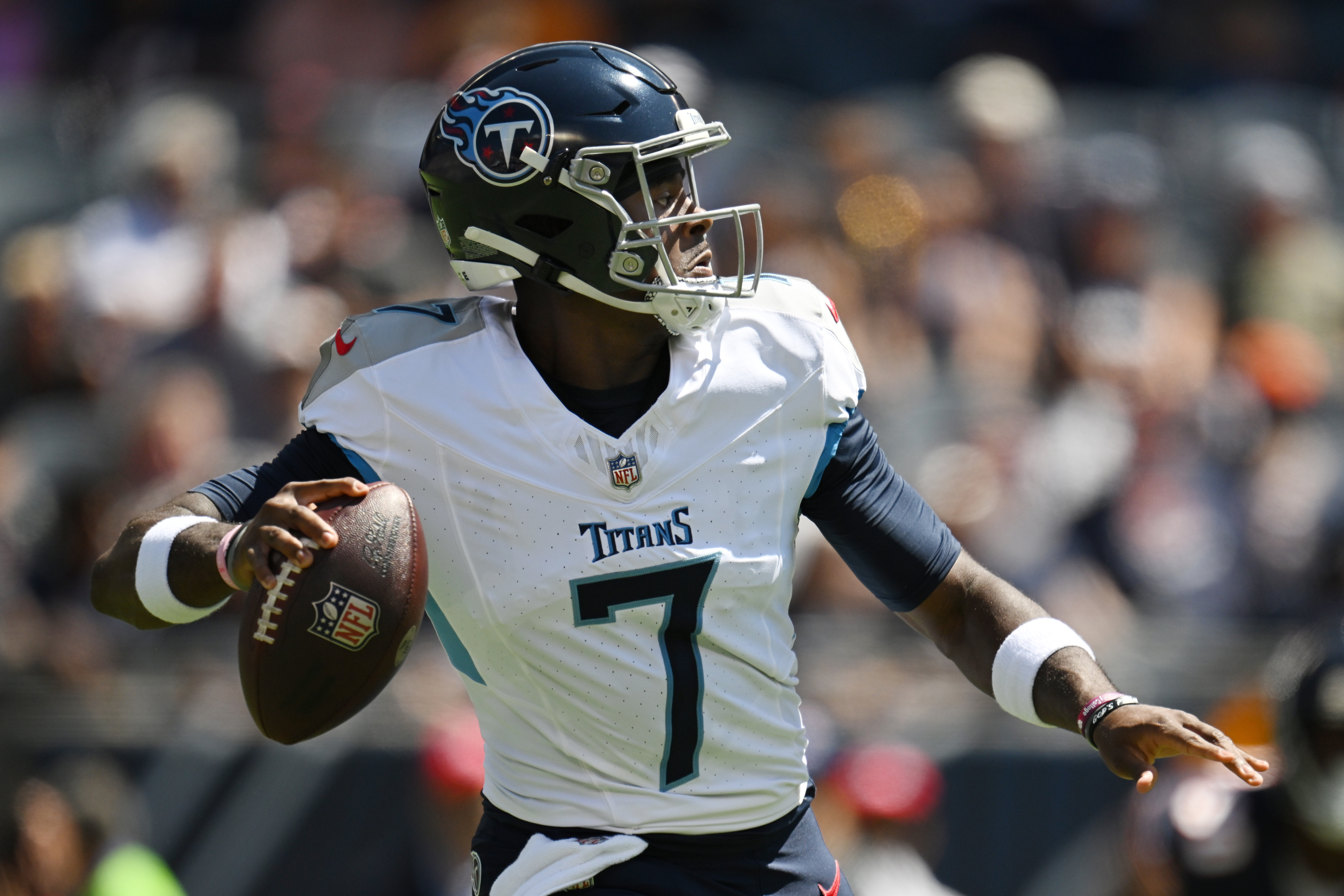 Chicago Bears offensive tackle Aviante Collins (74) blocks against the Tennessee  Titans during the first half of an NFL preseason football game, Saturday,  Aug. 12, 2023, in Chicago. (AP Photo/Kamil Krzaczynski Stock