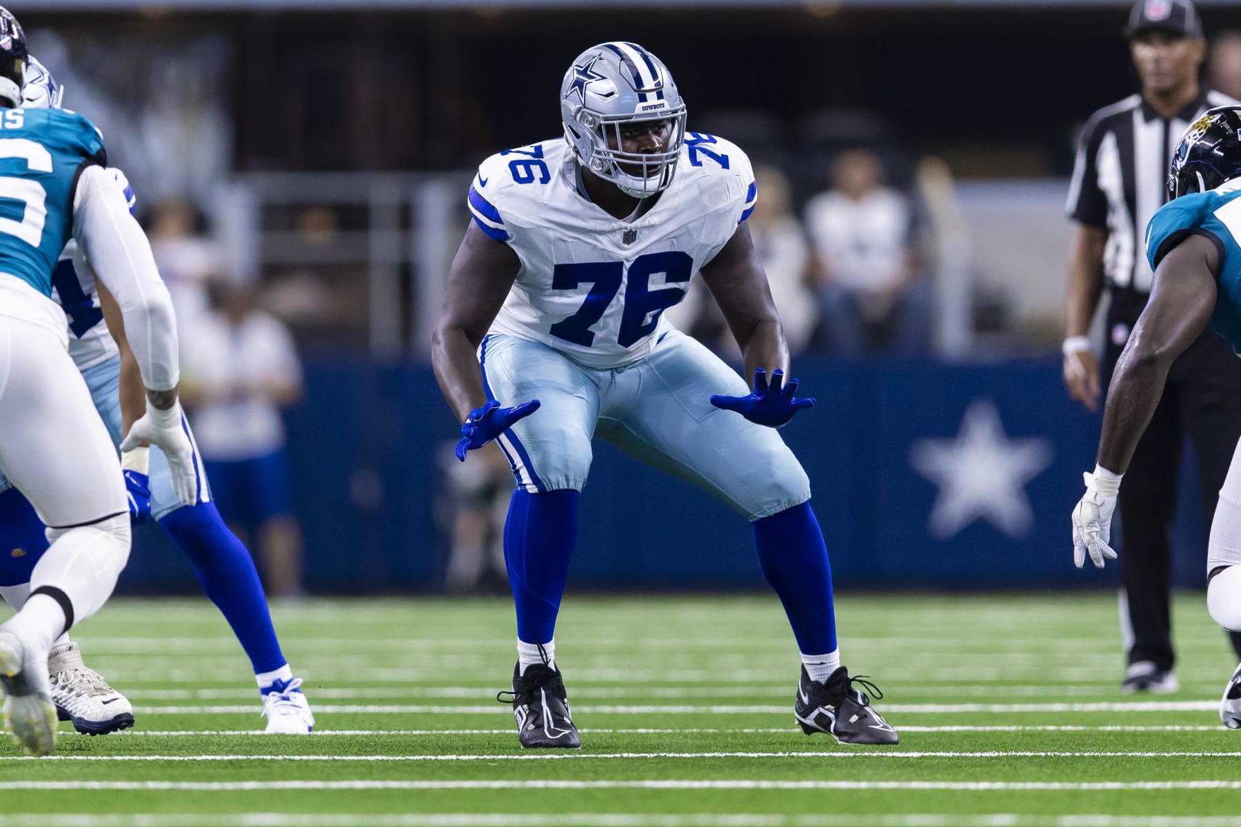 Dallas Cowboys offensive tackle Asim Richards (76) runs out on to