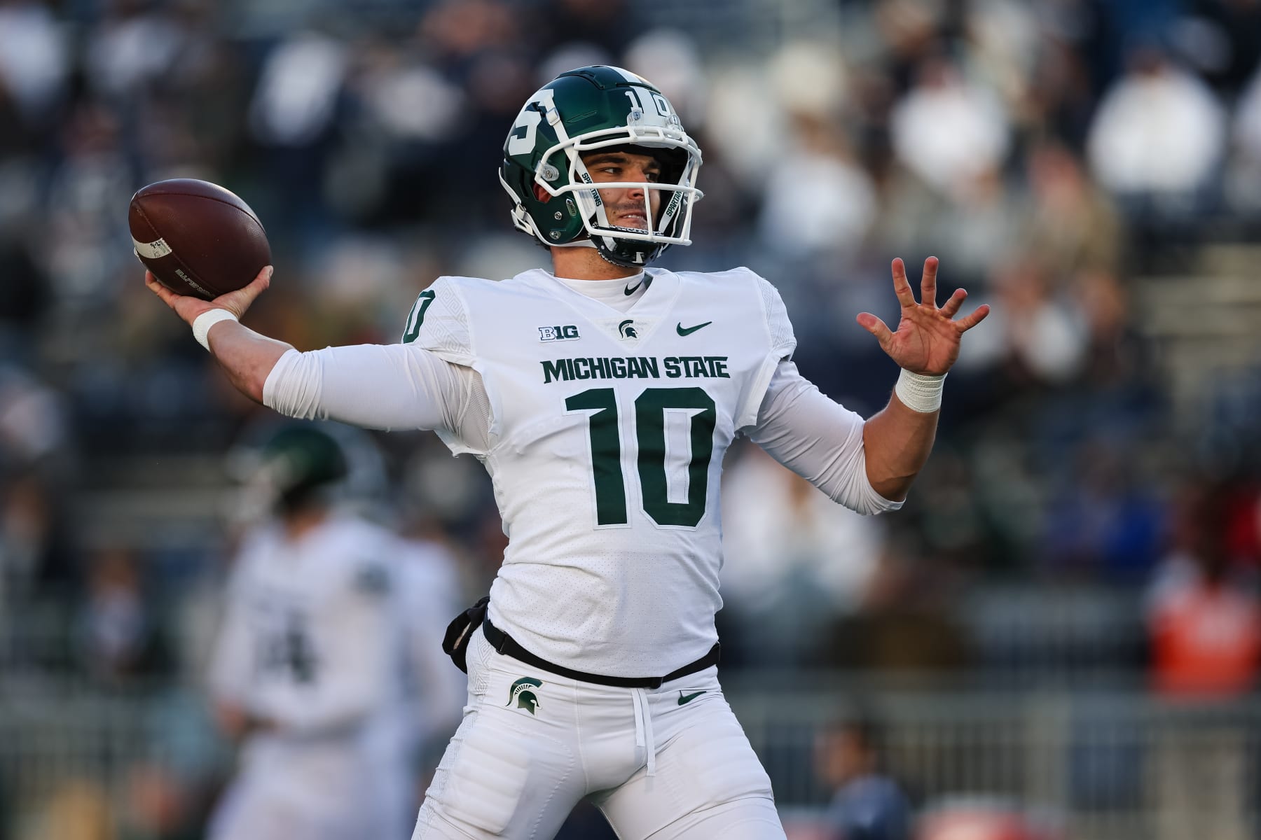 STATE COLLEGE, PA - NOVEMBER 26: Payton Thorne #10 of the Michigan State Spartans warms up before the game against the Penn State Nittany Lions at Beaver Stadium on November 26, 2022 in State College, Pennsylvania. (Photo by Scott Taetsch/Getty Images)