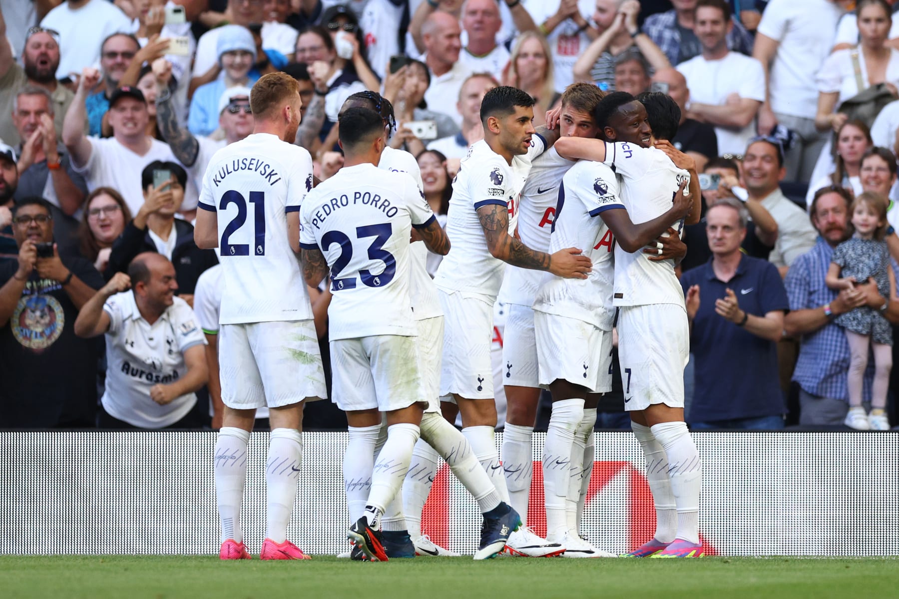 LONDON, ENGLAND - AUGUST 19: Pape Matar Sarr of Tottenham Hotspur (2L) celebrates with teammates after scoring the team's first goal during the Premier League match between Tottenham Hotspur and Manchester United at Tottenham Hotspur Stadium on August 19, 2023 in London, England. (Photo by Clive Rose/Getty Images)