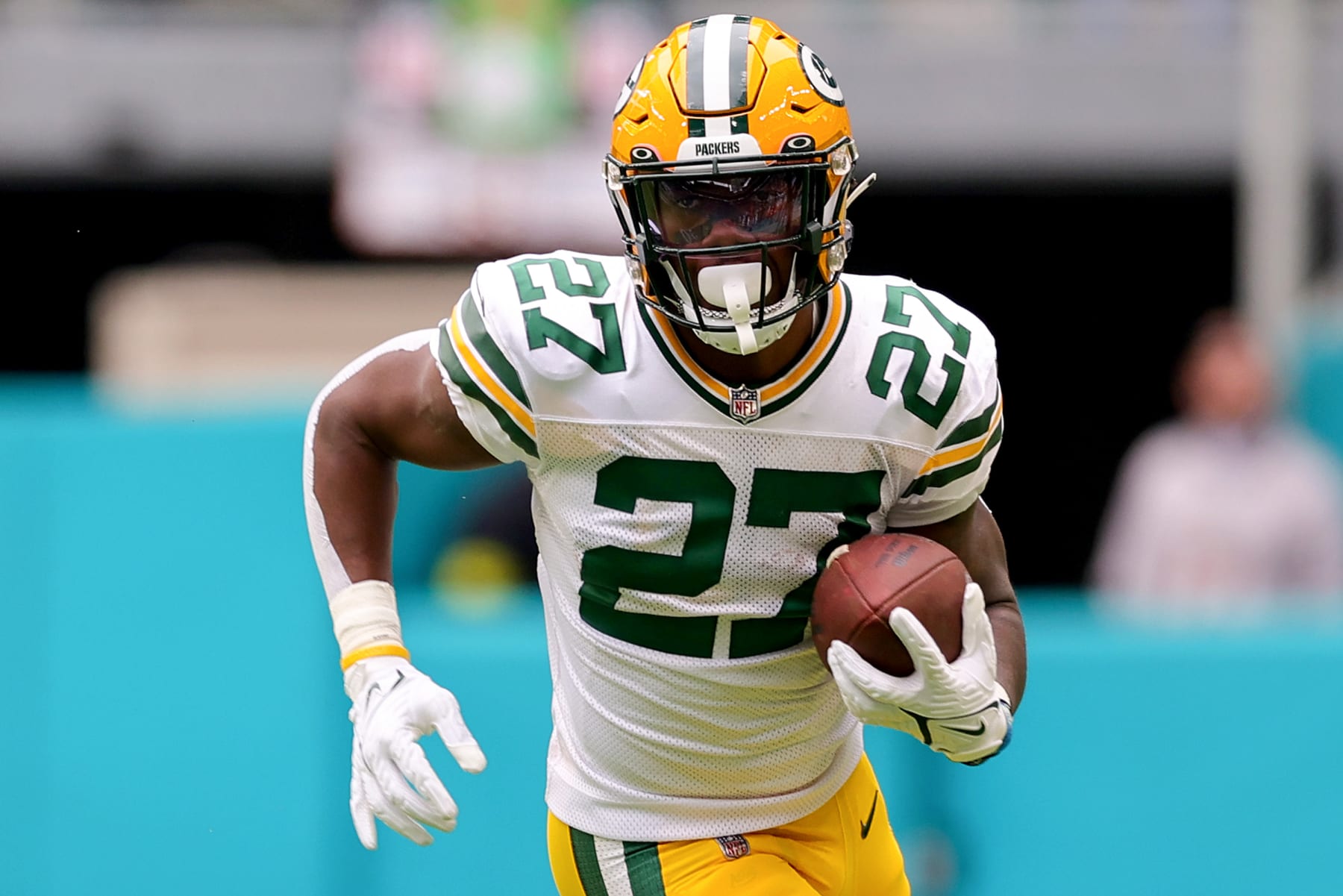 Green Bay, WI, USA. 15th Nov, 2020. Green Bay Packers running back Aaron  Jones #33 rushes the ball during the NFL Football game between the  Jacksonville Jaguars and the Green Bay Packers