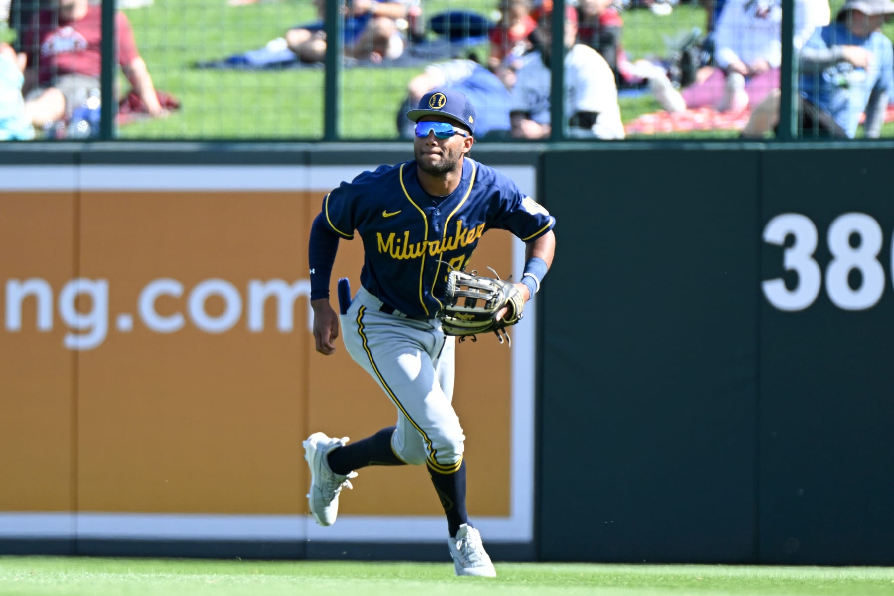 Milwaukee Brewers' Brady Clark is hit by a pitch from Minnesota