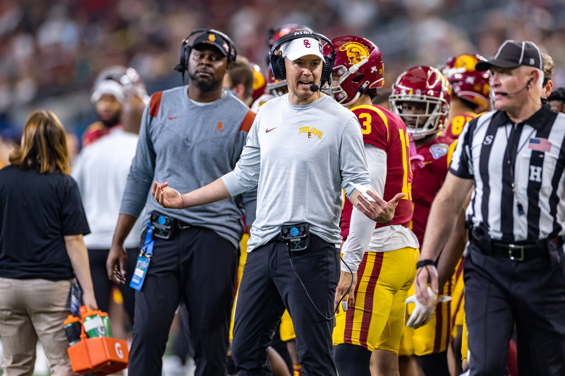 ARLINGTON, TX - JANUARY 02: USC Trojans head coach Lincoln Riley tries to get the referees attention on the sideline during the Goodyear Cotton Bowl game between the USC Trojans and Tulane Green Wave on January 02, 2023 at AT&T Stadium in Arlington, TX. (Photo by Matthew Visinsky/Icon Sportswire via Getty Images) ARLINGTON, TX - JANUARY 02: USC Trojans head coach Lincoln Riley tries to get the referees attention on the sideline during the Goodyear Cotton Bowl game between the USC Trojans and Tulane Green Wave on January 02, 2023 at AT&T Stadium in Arlington, TX. (Photo by Matthew Visinsky/Icon Sportswire via Getty Images)
