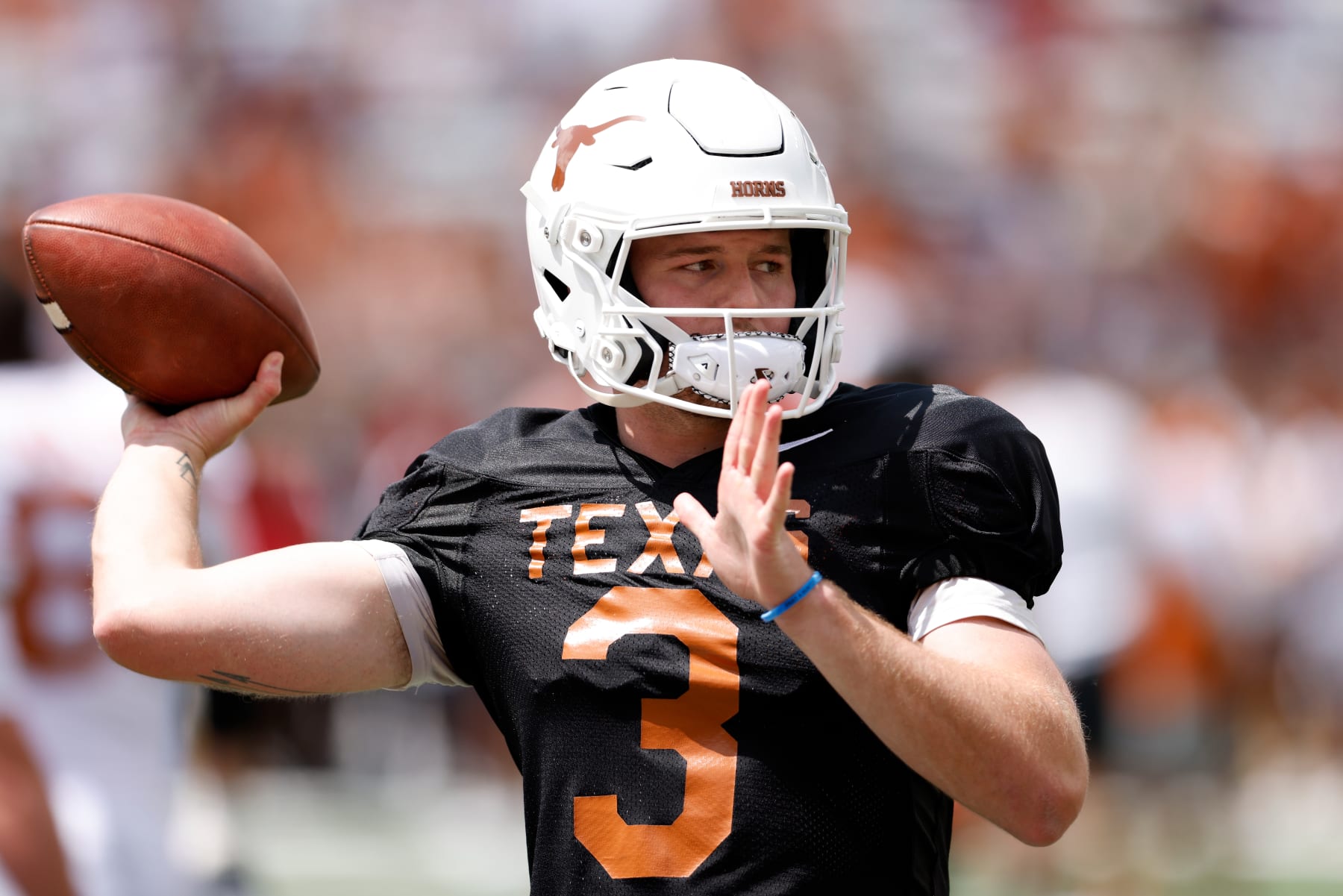 AUSTIN, TEXAS - APRIL 15: Quinn Ewers #3 of the Texas Longhorns warms up before the Texas Football Orange-White Spring Football Game at Darrell K Royal-Texas Memorial Stadium on April 15, 2023 in Austin, Texas. (Photo by Tim Warner/Getty Images) AUSTIN, TEXAS - APRIL 15: Quinn Ewers #3 of the Texas Longhorns warms up before the Texas Football Orange-White Spring Football Game at Darrell K Royal-Texas Memorial Stadium on April 15, 2023 in Austin, Texas. (Photo by Tim Warner/Getty Images)