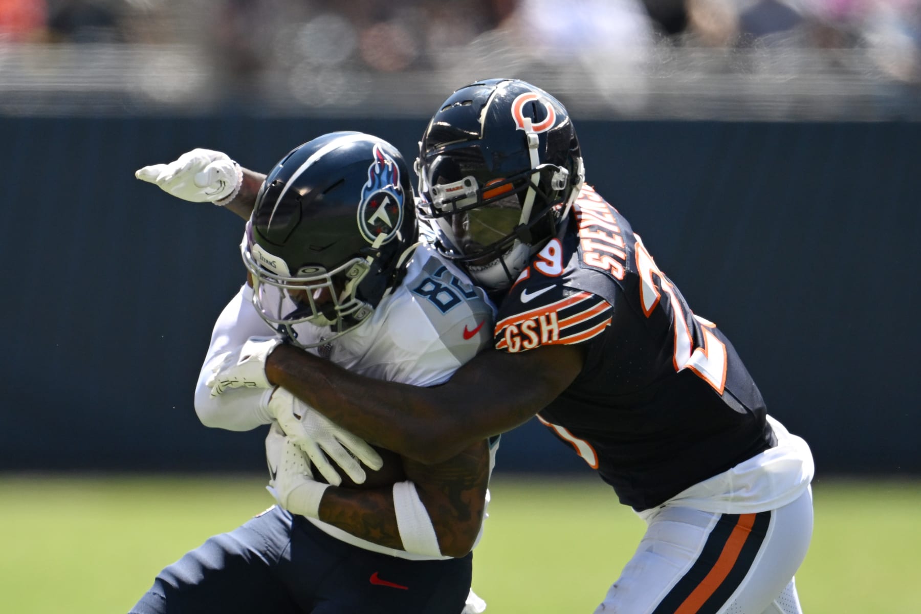 Denver Broncos running back Jaleel McLaughlin (38) is pursued by